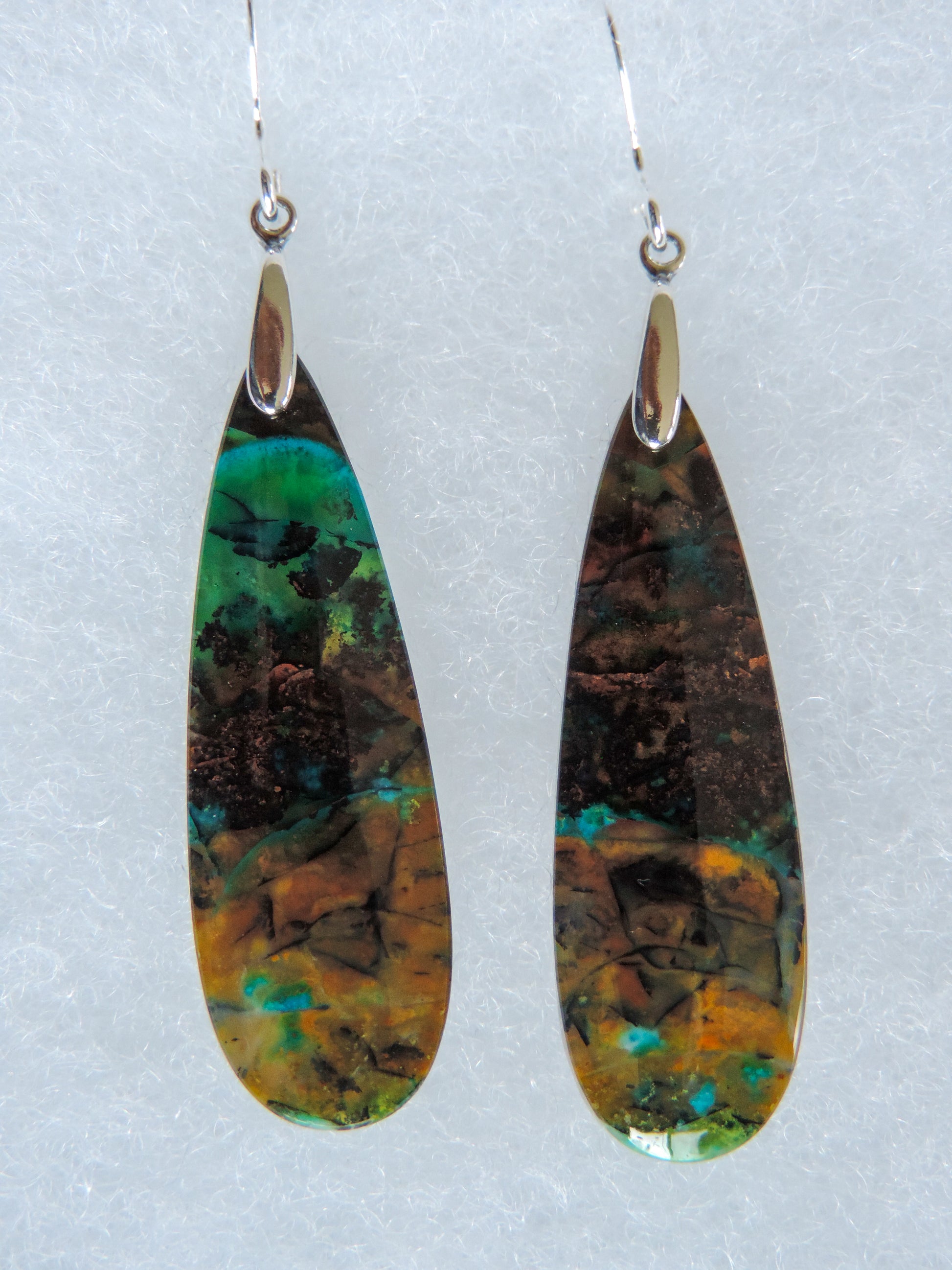 Indonesian Blue Opalized Wood & Sterling Silver Earrings  Feel treasured when you wear these earrings!  Extremely rare and lovely, Indonesian Blue Opalized Wood is a cherished material used by lapidary artists for creating stunning pieces of jewelry.