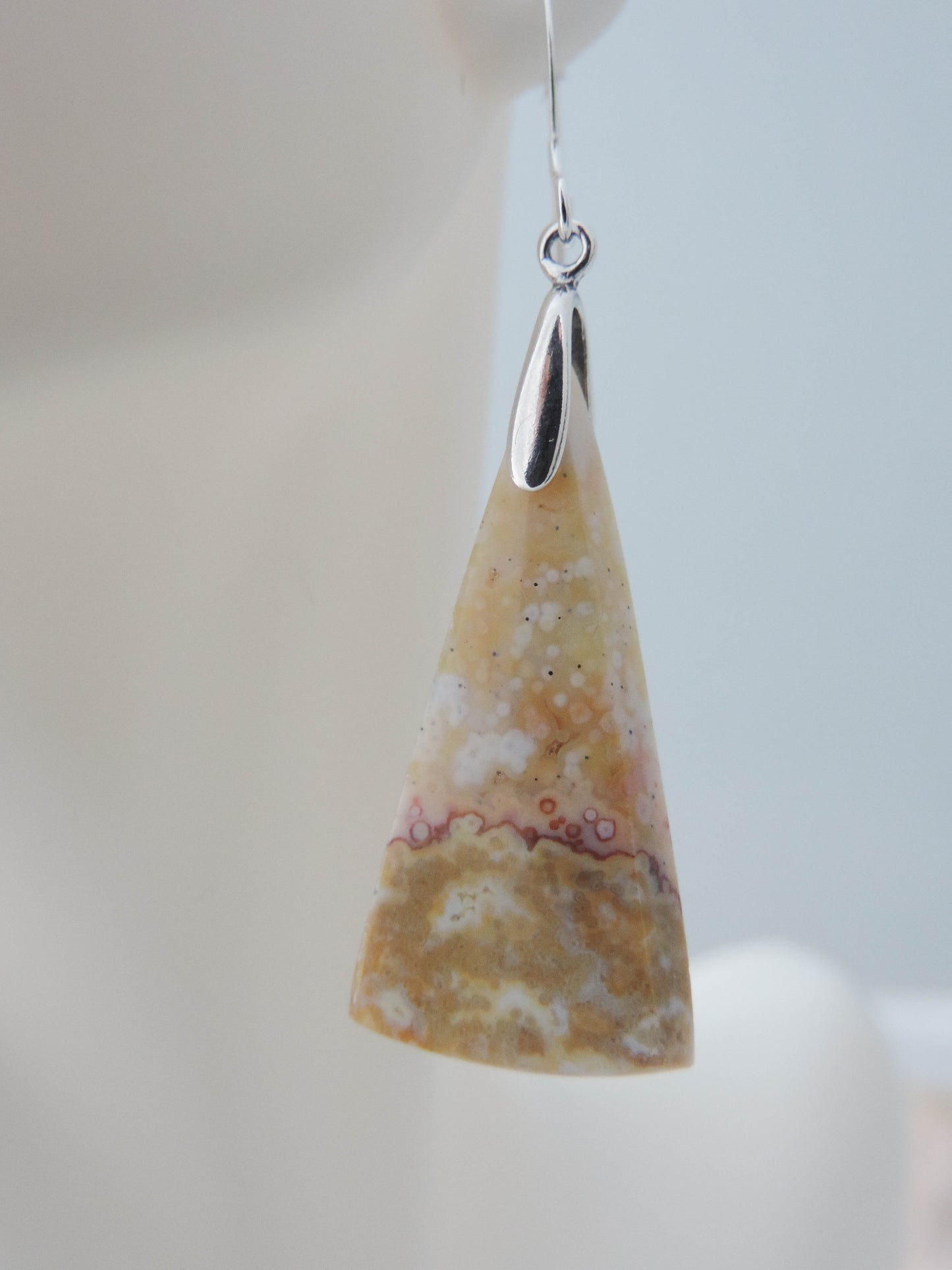 Our hand crafted jewelry earrings are photographed next to a ruler for size. This stone is a natural color, no dyes or heat treatment have been used. It was photographed without filters on automatic setting in natural light; however, slight color variations may occur due to digitization. Natural stones can have nooks and crannies, inclusions or small cracks, these