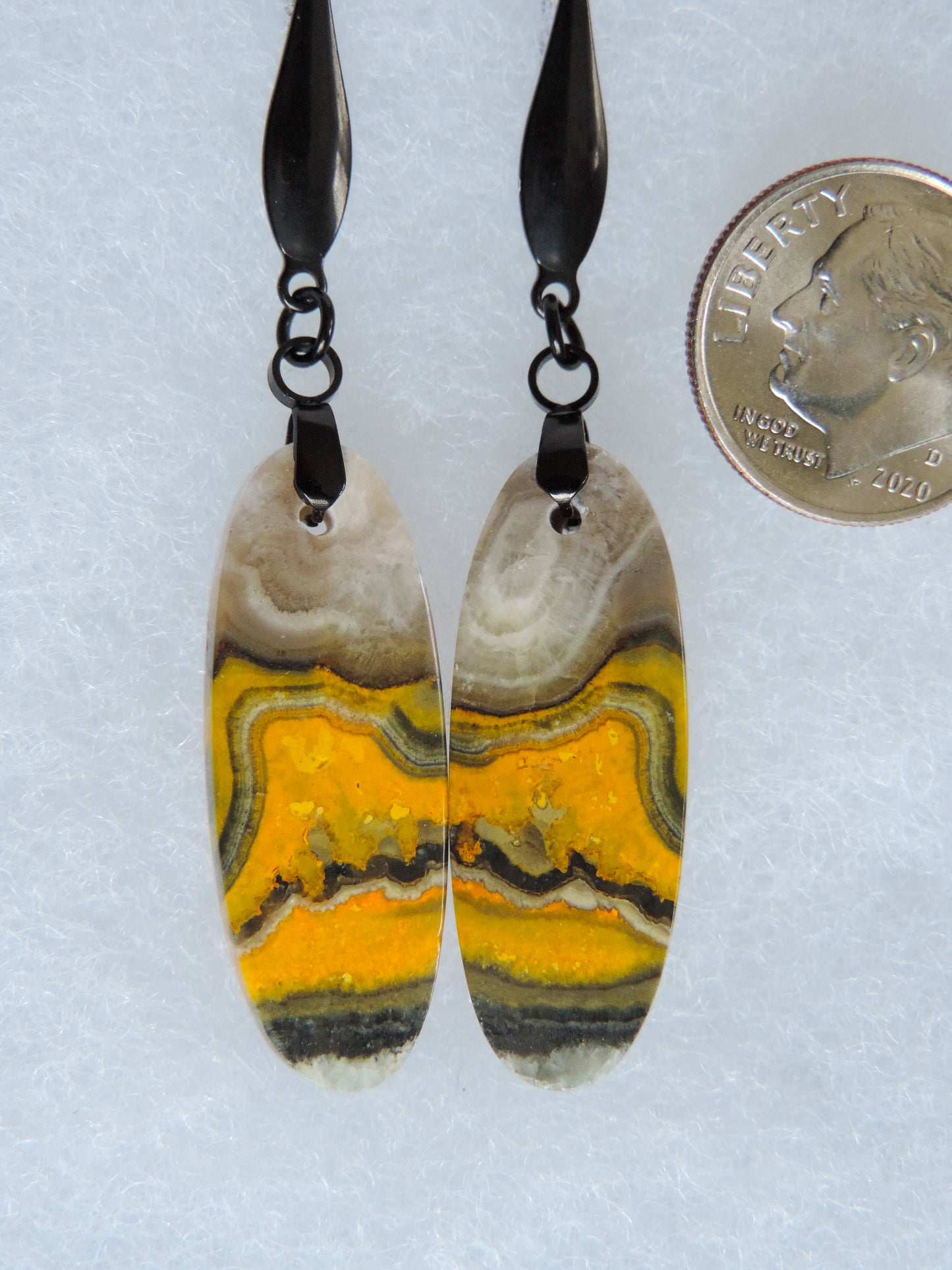 Bee the buzz when you wear these fun Bumblebee Jasper Earrings!  Bumblebee Jasper is named for its yellow, white, orange and black colored banding which resembles a common bumblebee.  This mineral was discovered in the Papandayan Volcano, West Java Province, Indonesia.