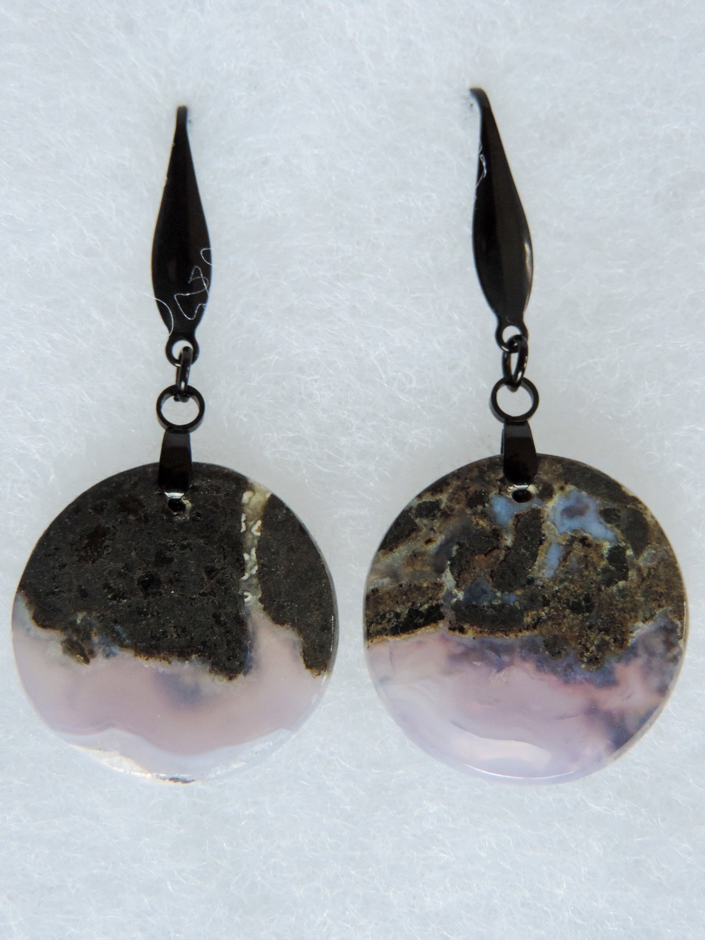 Purple gemstones hold significant and powerful spiritual qualities.  Purple has been associated with wealth, passion, ambition, magic, awareness, mystery, tranquility, inspiration, understanding, calmness and wisdom to name a few.