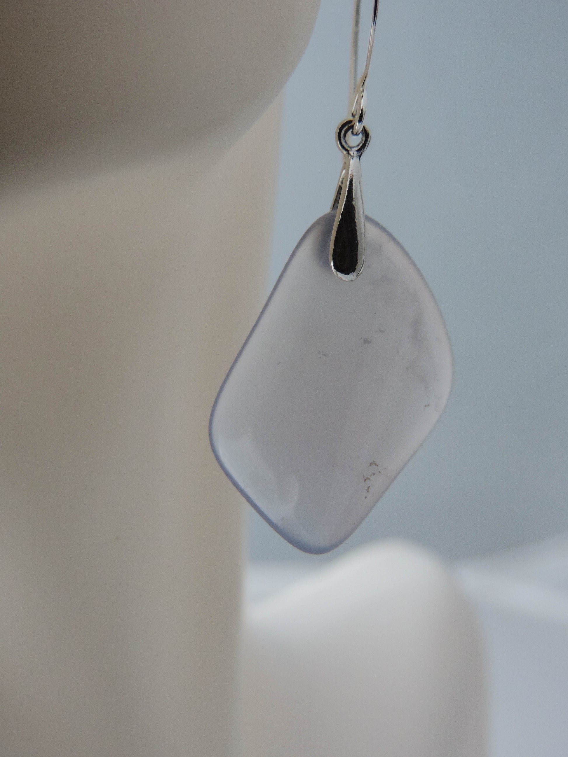 The bail and earring wires are authentic 925 sterling silver.  Wear these original earrings and stand out in a crowd!  Known as the Treasure State, Montana’s landscape is an abundant resource for precious and semi-precious stones.  One of the semi-precious stones, Madison Blue Agate, are featured in these earrings.