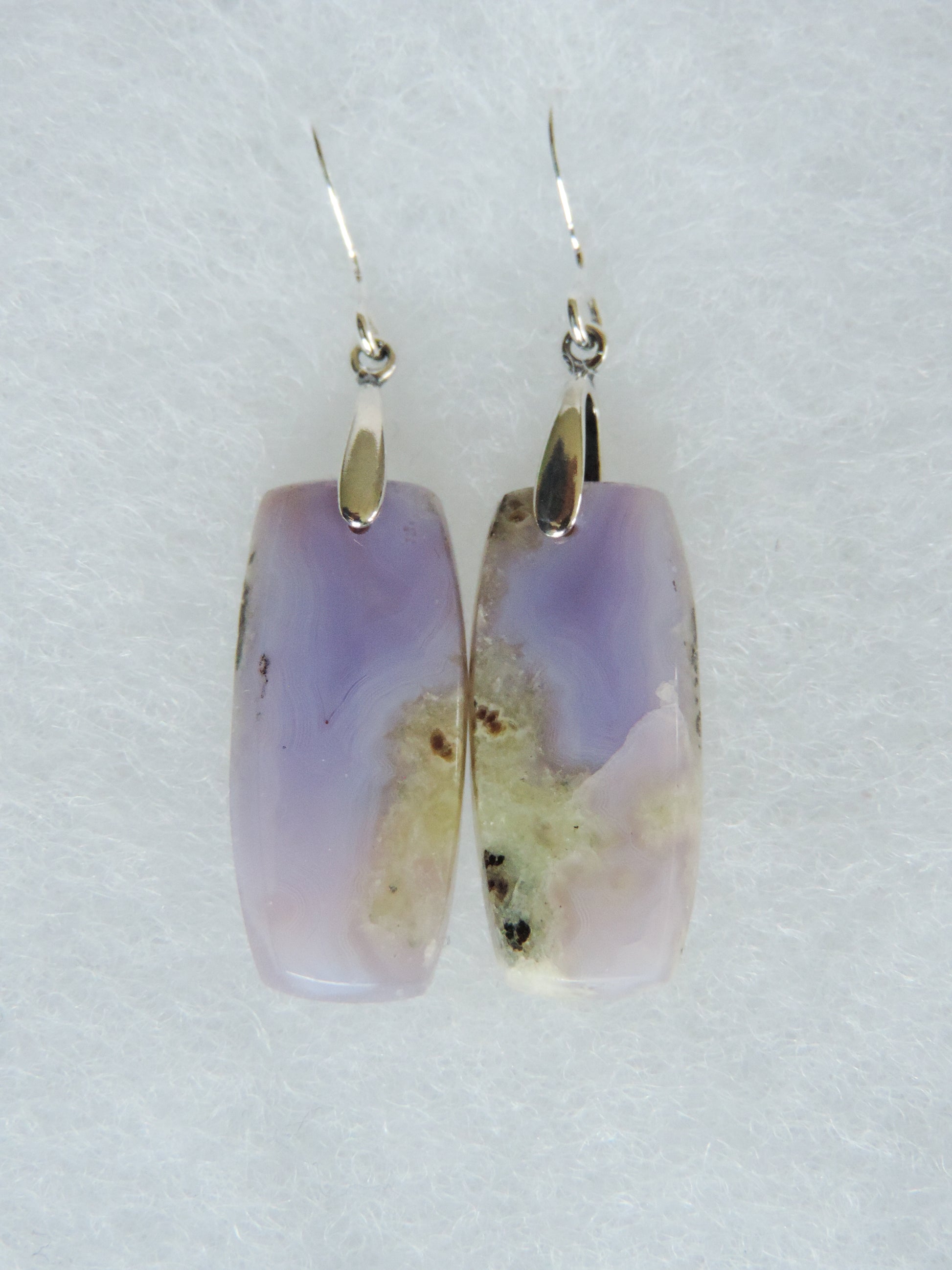 Purple Moss Agate & Sterling Silver Earrings.  Purple gemstones hold significant and powerful spiritual qualities.  Purple has been associated with wealth, passion, ambition, magic, awareness, mystery, tranquility, inspiration, understanding, calmness and wisdom to name a few.  Throughout history, the spiritual meanings and properties of purple gemstones have always been positive as they were known to bring forth the purest aspirations of human kind.