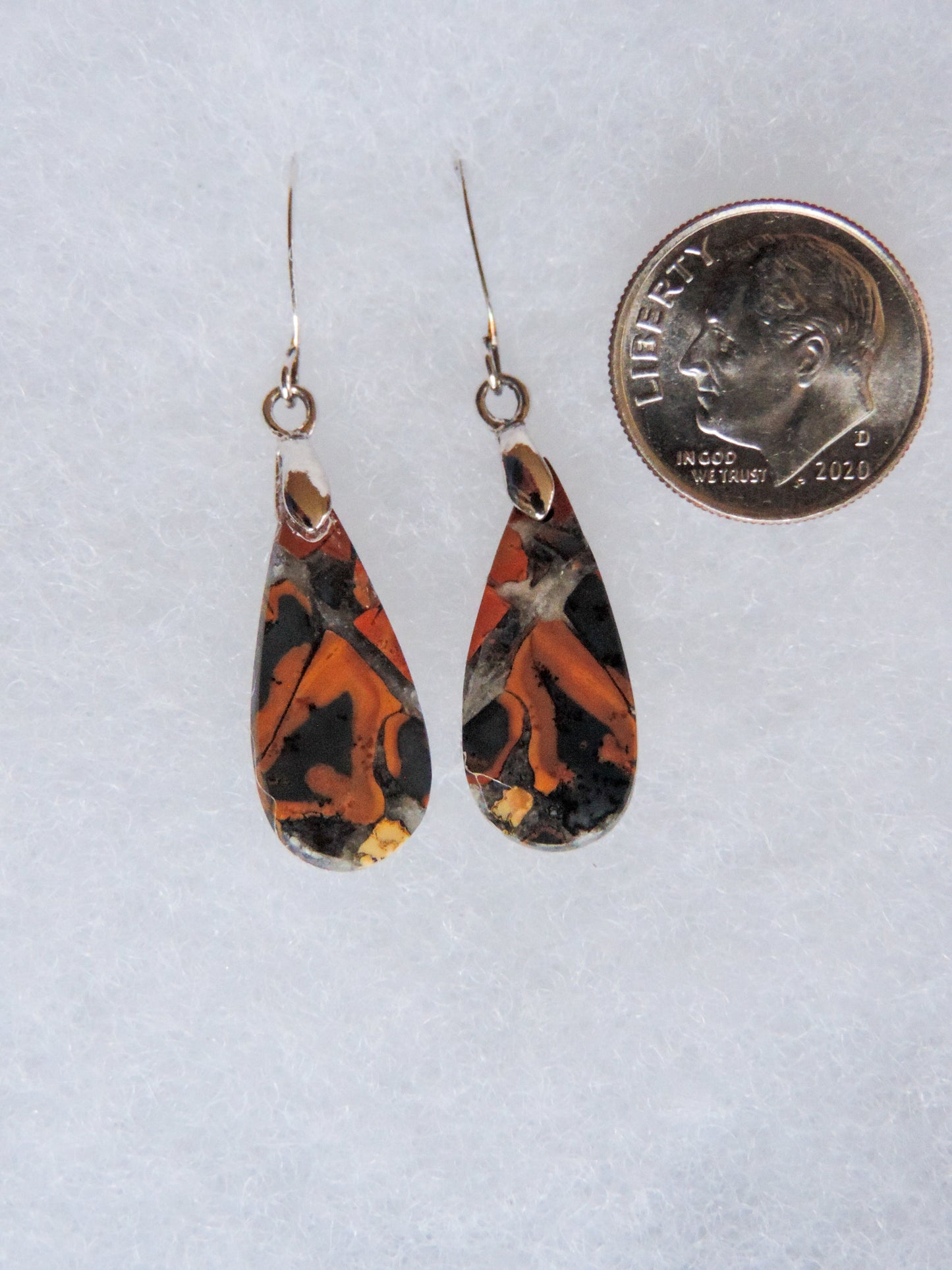 This stone is a natural color, no dyes or heat treatment have been used. It was photographed without filters natural light; however, slight color variations may occur due to digitization. Natural stones can have nooks and crannies, inclusions or small cracks, these distinguishing features lend character to the piece.