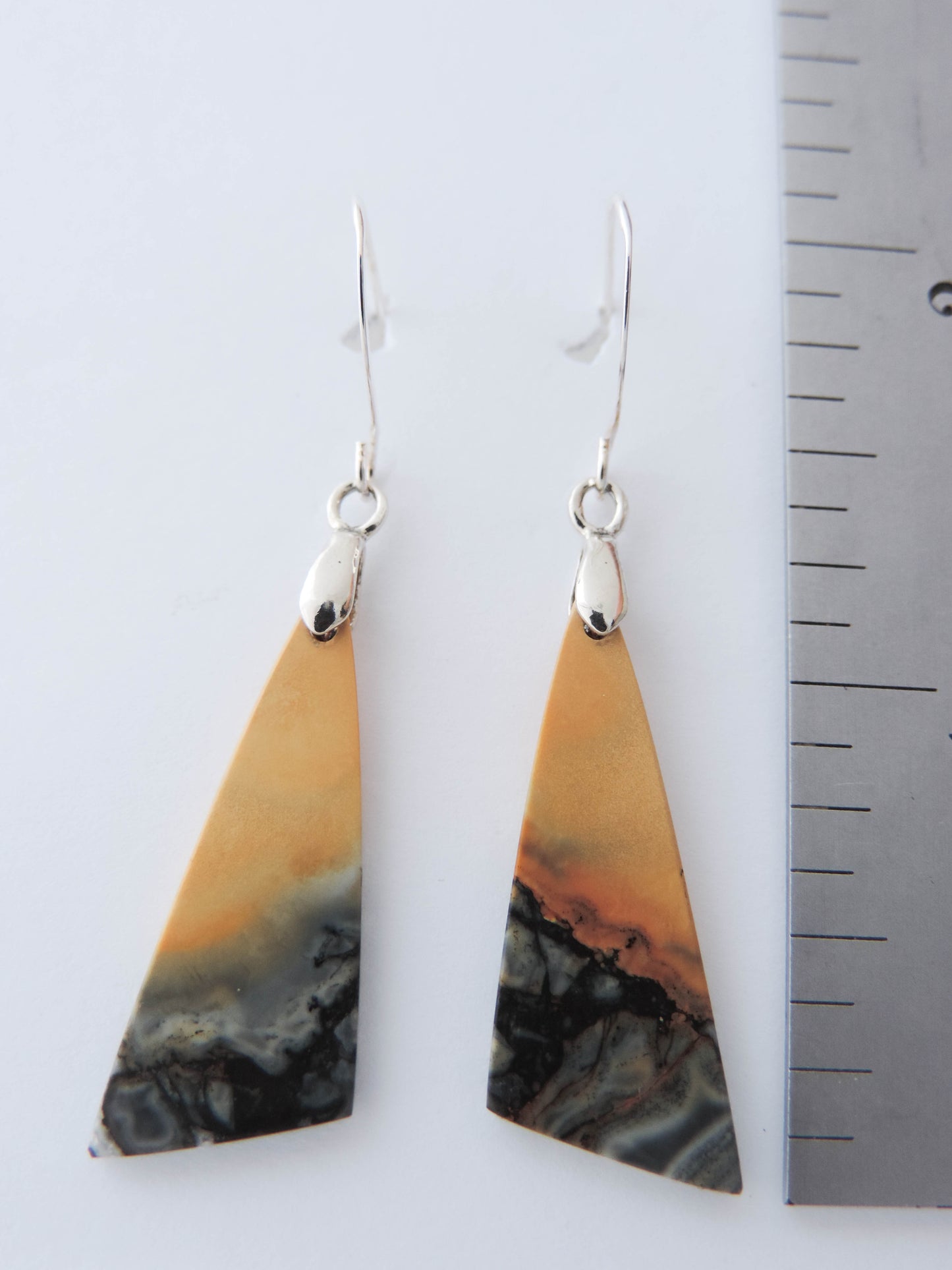 Maligano Jasper is a specific type of jasper found in Indonesia and forms in ancient volcanic hot springs areas. It’s named after a small village in Sulawesi, Indonesia and is mined by hand. Exquisite in appearance, this jewelry will compliment your formal or casual attire. The bail and earring wires are authentic 925 sterling silver.