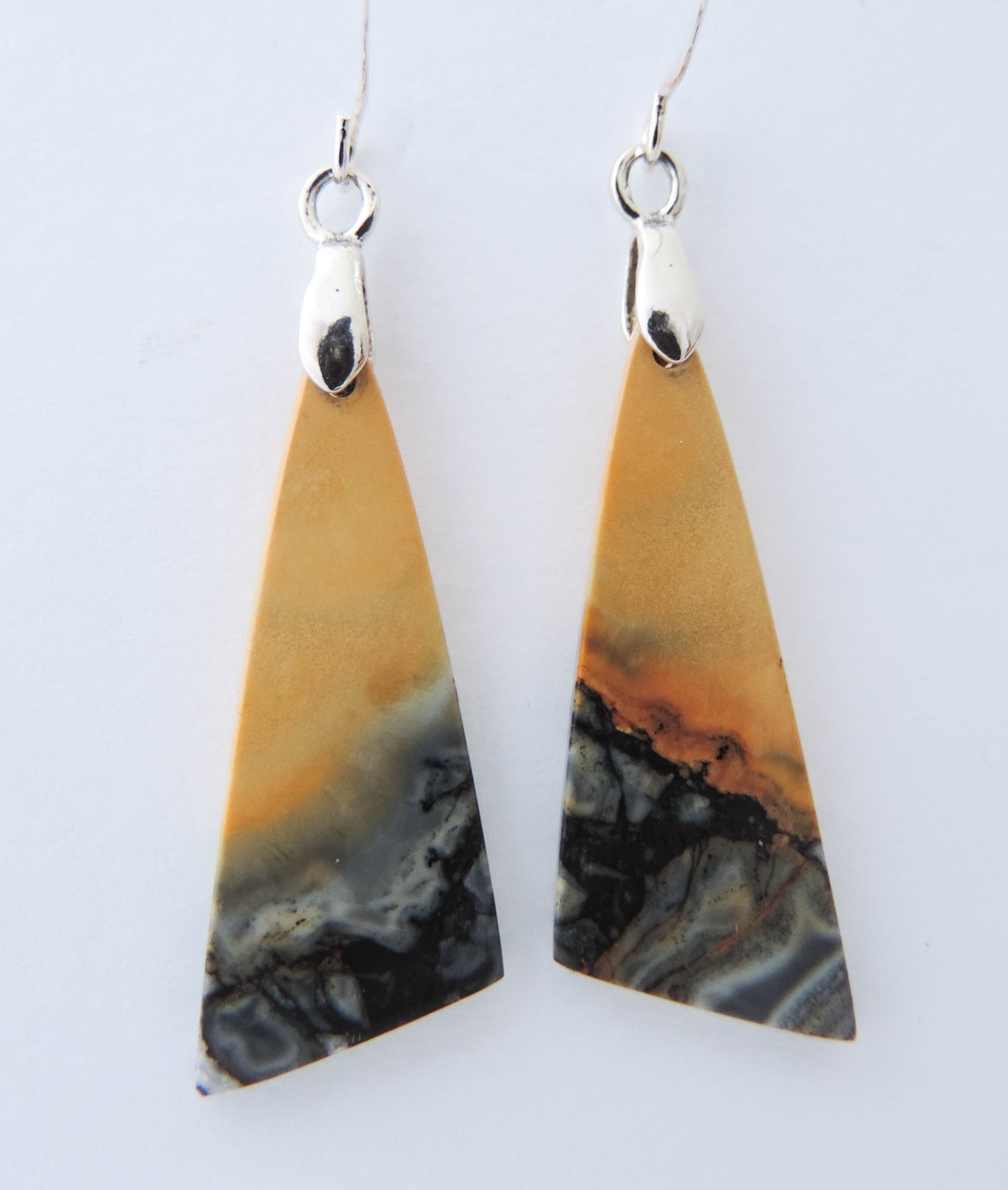 Maligano Jasper is a specific type of jasper found in Indonesia and forms in ancient volcanic hot springs areas. It’s named after a small village in Sulawesi, Indonesia and is mined by hand. Exquisite in appearance, this jewelry will compliment your formal or casual attire. The bail and earring wires are authentic 925 sterling silver.