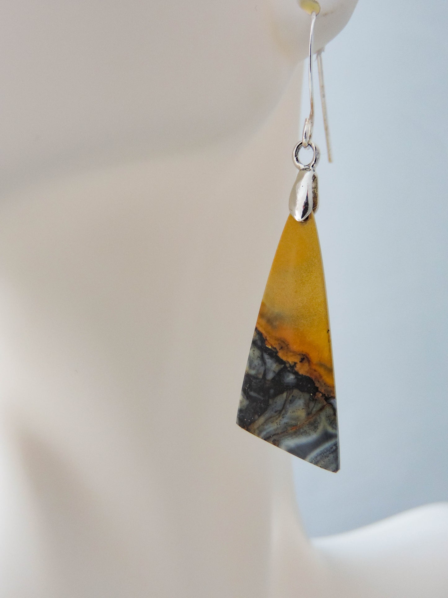 Maligano Jasper is a specific type of jasper found in Indonesia and forms in ancient volcanic hot springs areas. It’s named after a small village in Sulawesi, Indonesia and is mined by hand. Exquisite in appearance, this jewelry will compliment your formal or casual attire. The bail and earring wires are authentic 925 sterling silver.