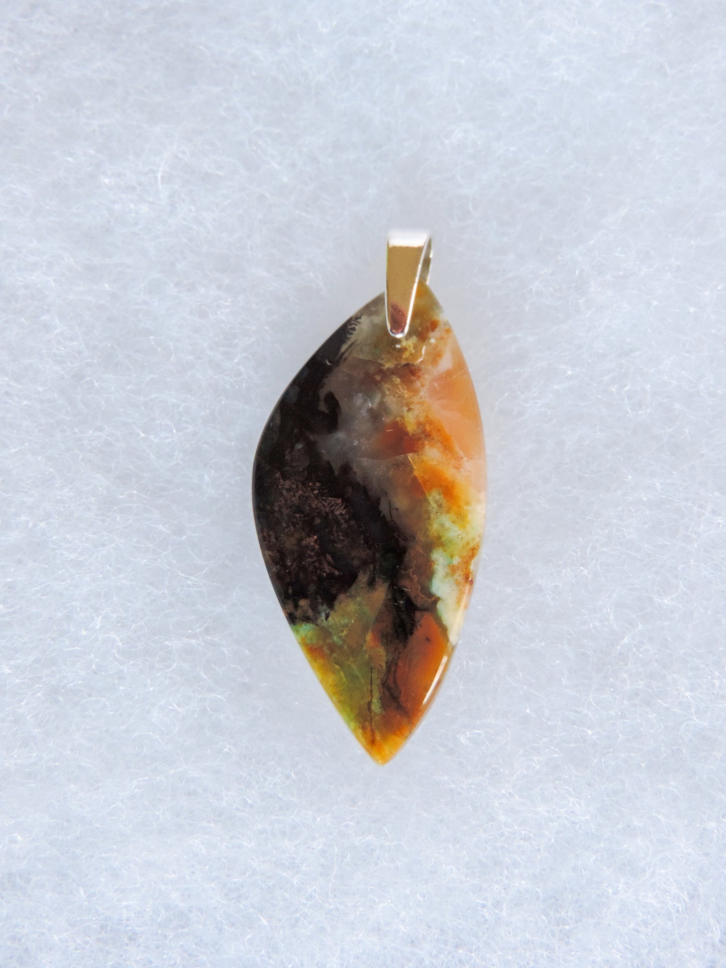 Indonesian Blue Opalized Wood Pendant.  Extremely rare and lovely, Indonesian Blue Opalized Wood is a cherished material used by lapidary artists for creating stunning pieces of jewelry.