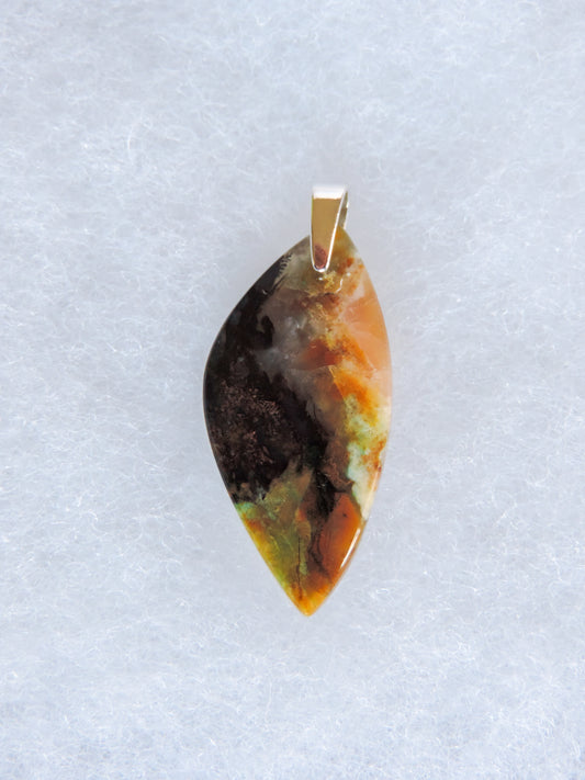 Indonesian Blue Opalized Wood Pendant.  Extremely rare and lovely, Indonesian Blue Opalized Wood is a cherished material used by lapidary artists for creating stunning pieces of jewelry.