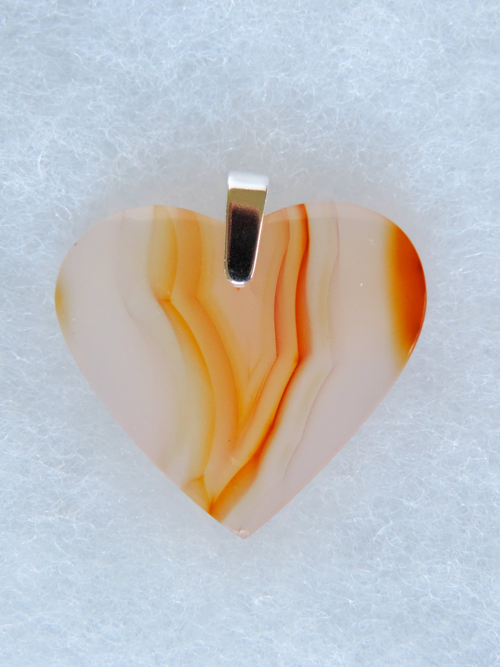 Carnelian Agate Pendant.  Indonesian Agates exhibit a wide variety of colors and amazing complexity.  No two agates are exactly alike, each one being a unique and beautiful creation!