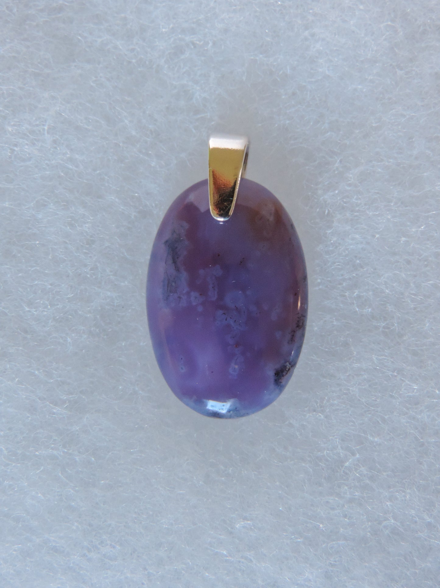 Purple Moss Agate Pendant & Sterling Silver.  Purple Moss Agate Pendant.  Purple gemstones hold significant and powerful spiritual qualities.  Purple has been associated with wealth, passion, ambition, magic, awareness, mystery, tranquility, inspiration, understanding, calmness and wisdom to name a few.