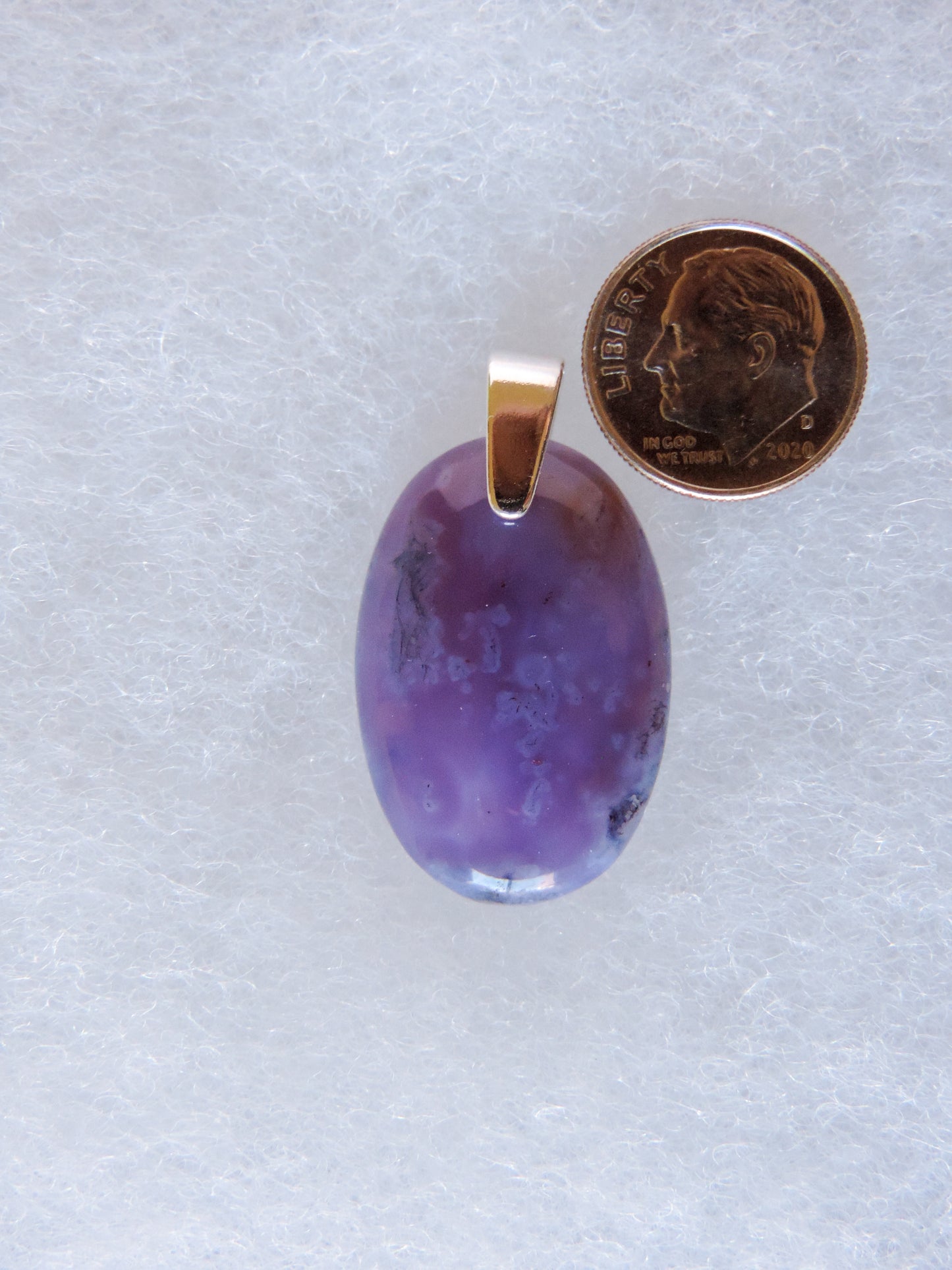 This stone is a natural color, no dyes or heat treatment have been used.  It was photographed without filters; however, slight color variations may occur due to digitization.  Natural stones can have nooks and crannies, inclusions or small cracks, these distinguishing features lend character to the piece.