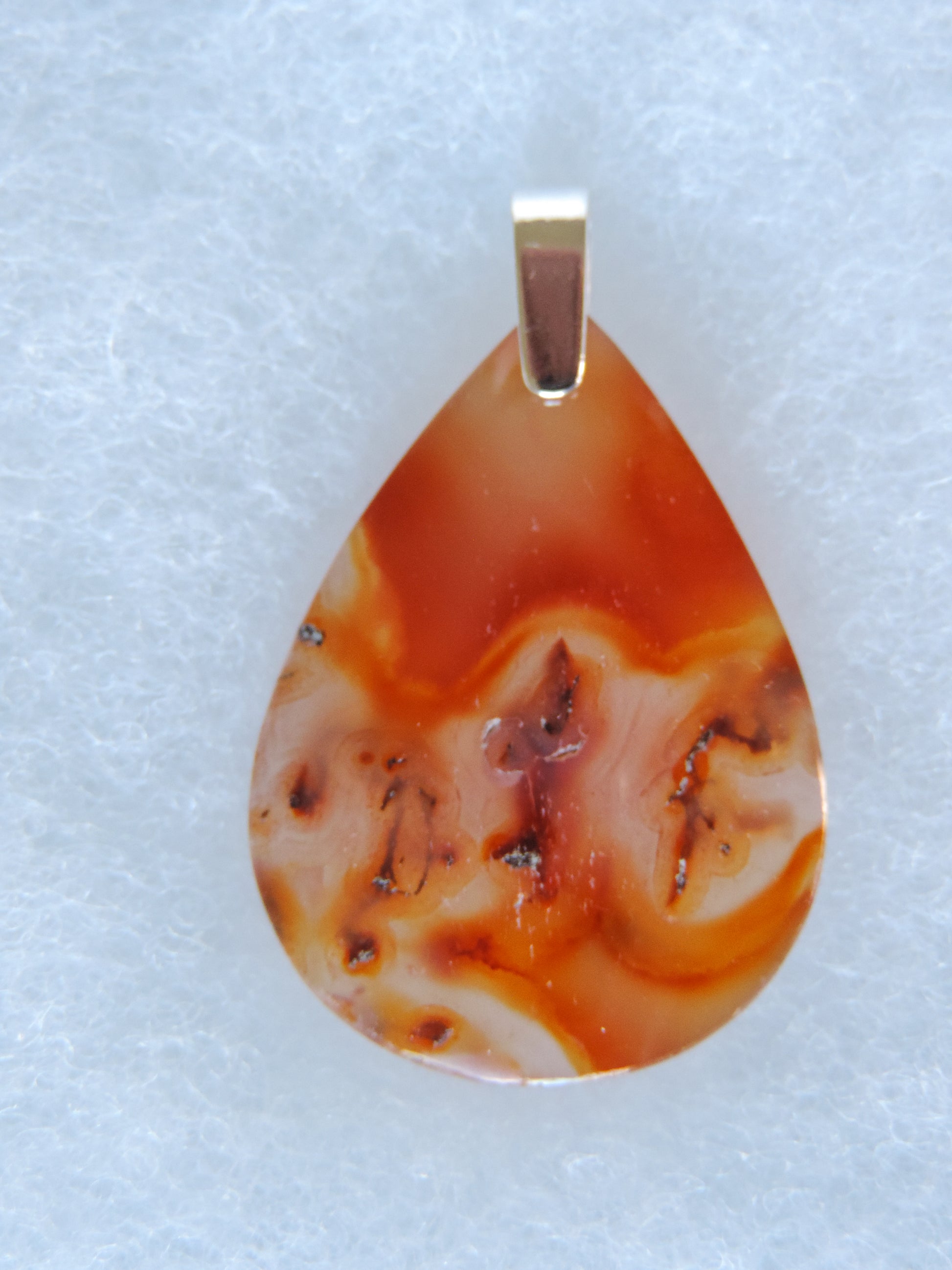 Timor Agate & Sterling Silver Pendant.  Timor Agate Pendant.  Indonesian Agates exhibit a wide variety of colors and amazing complexity.  No two agates are exactly alike, each one being a unique and beautiful creation!