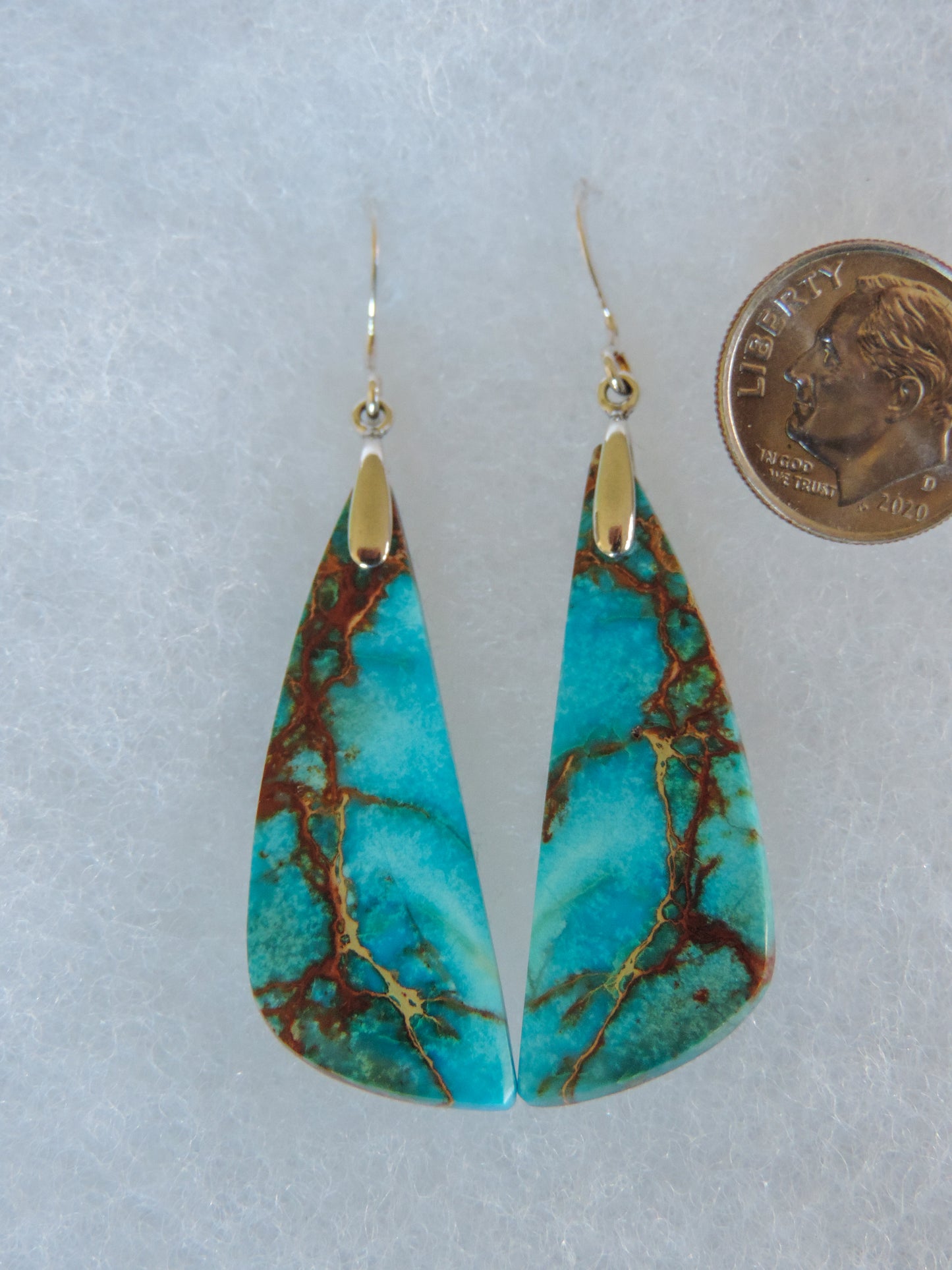 This stone is a natural color, no dyes or heat treatment have been used. It was photographed without filters in natural light; however, slight color variations may occur due to digitization. Natural stones can have nooks and crannies, inclusions or small cracks, these distinguishing features lend character to the piece.