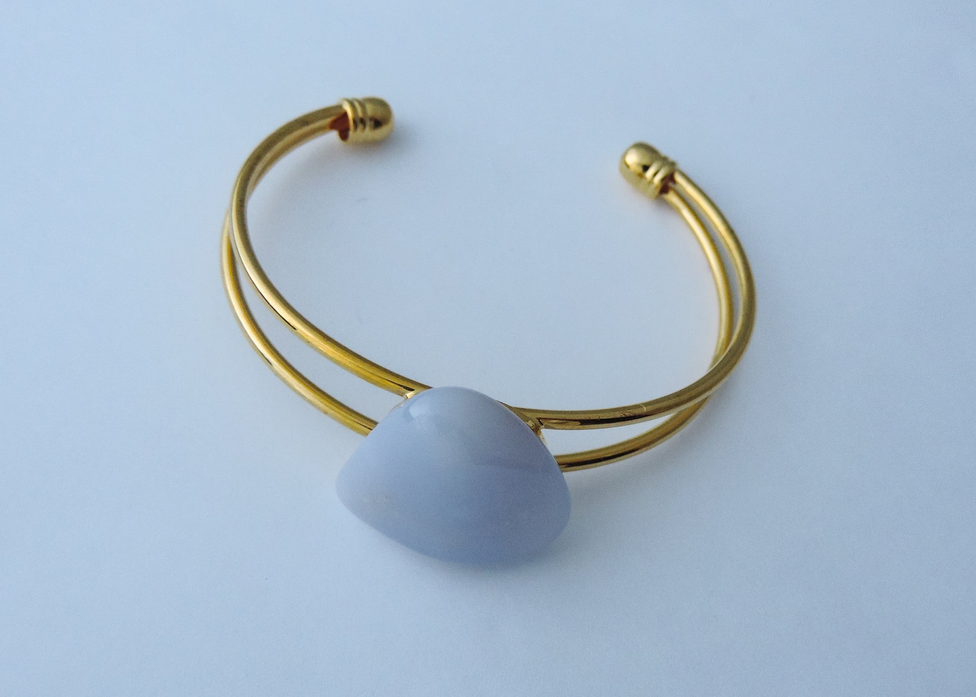 Montana’s landscape is an abundant resource for precious and semi-precious stones.  One of the semi-precious stones, Madison Blue Agate, is featured in this jewelry piece.The translucent blue agate and its spectacular color variations have an alluring effect, many people find the stone naturally relaxing.  Original and unique in design, each piece is hand crafted by lapidary artists in Montana.