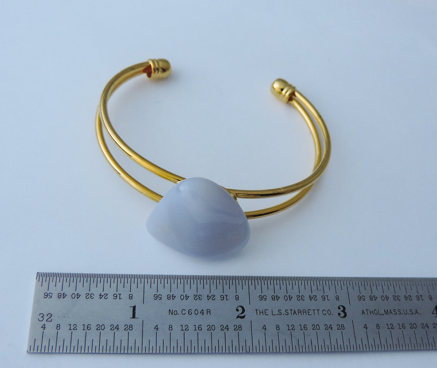 Montana’s landscape is an abundant resource for precious and semi-precious stones.  One of the semi-precious stones, Madison Blue Agate, is featured in this jewelry piece.The translucent blue agate and its spectacular color variations have an alluring effect, many people find the stone naturally relaxing.  Original and unique in design, each piece is hand crafted by lapidary artists in Montana.