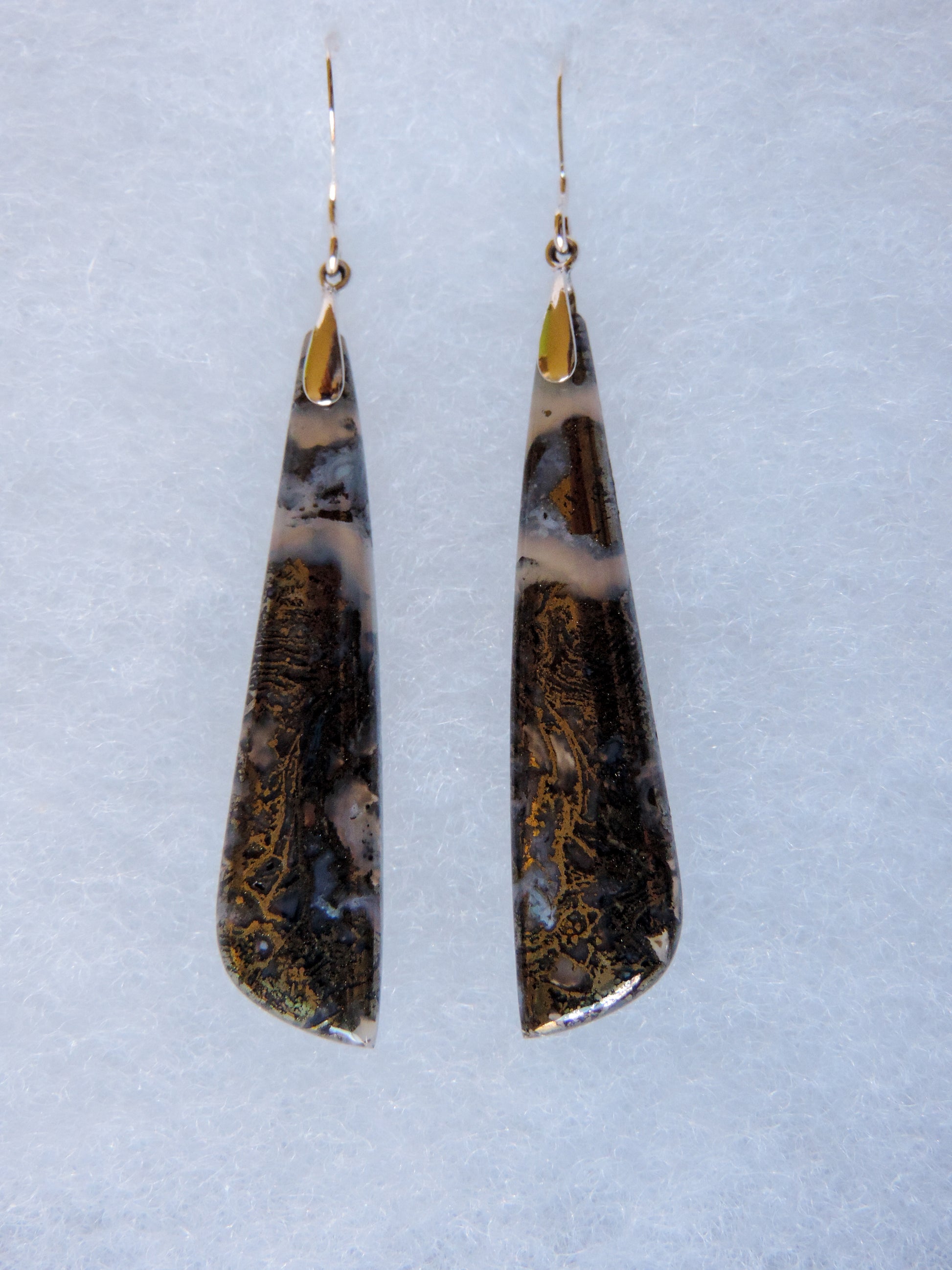 Marcasite Earrings & Sterling Silver.  Marcasite Earrings.  Marcasite has been a valued by many civilizations throughout history.  The word marcasite is a derivative of the Arabic word “markashatsa,” or “fire stone.”  This term isn’t in reference to its metallic shine.