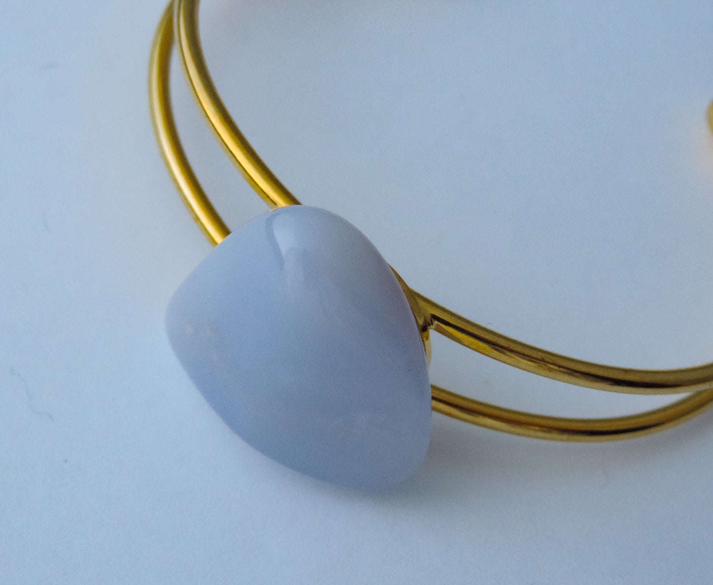 Montana’s landscape is an abundant resource for precious and semi-precious stones.  One of the semi-precious stones, Madison Blue Agate, is featured in this jewelry piece.The translucent blue agate and its spectacular color variations have an alluring effect, many people find the stone naturally relaxing.  Original and unique in design, each piece is hand crafted by lapidary artists in Montana.