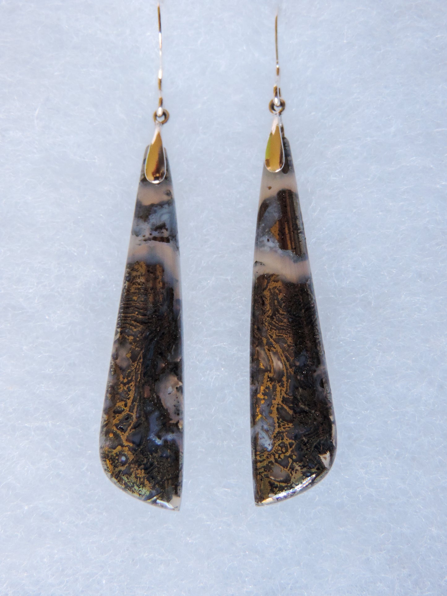 Marcasite can actually spark when struck with iron or flint. The ancient Incans, Greeks and Egyptians all valued marcasite, even Cleopatra adorned herself in marcasite gemstones. Choose your favorite marcasite earrings and adorn yourself like a queen! The bail and earring wire are authentic 925 sterling silver.