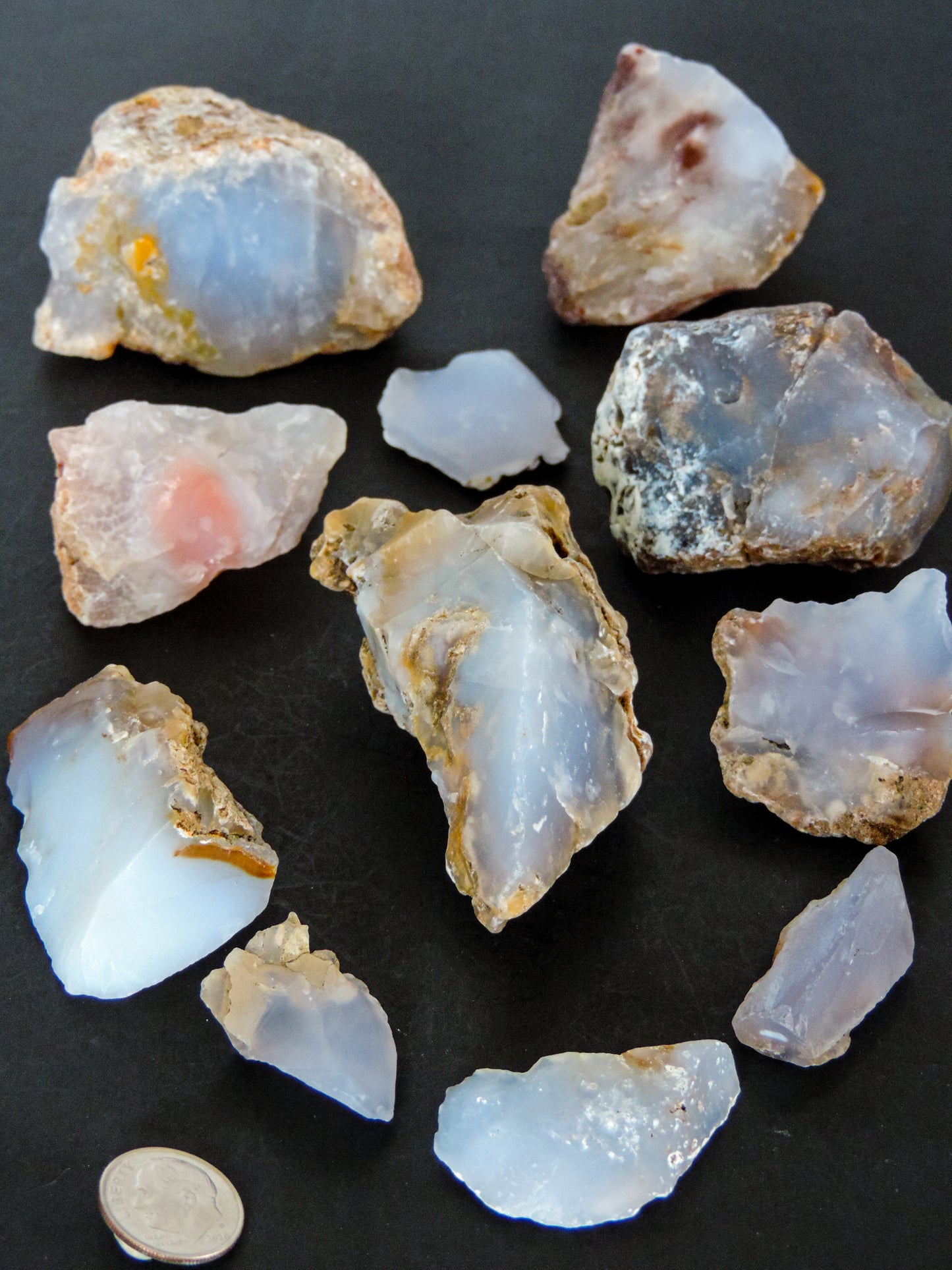 Madison Blue Agate bundle. Known as the Treasure State, Montana’s landscape is an abundant resource for precious and semi-precious stones. One of the semi-precious stones, Madison Blue Agate, is featured in this group. This rare stone is hand collected on private land in the mountains of Montana. These natural unrefined stones can have nooks and crannies, inclusions, or small cracks, these distinguishing features lend character to the piece.