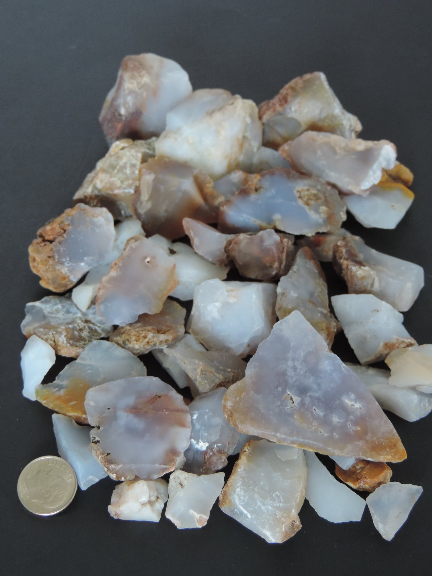 Madison Blue Agate bundle. Known as the Treasure State, Montana’s landscape is an abundant resource for precious and semi-precious stones. One of the semi-precious stones, Madison Blue Agate, is featured in this group. This rare stone is hand collected on private land in the mountains of Montana. These natural unrefined stones can have nooks and crannies, inclusions, or small cracks, these distinguishing features lend character to the piece.