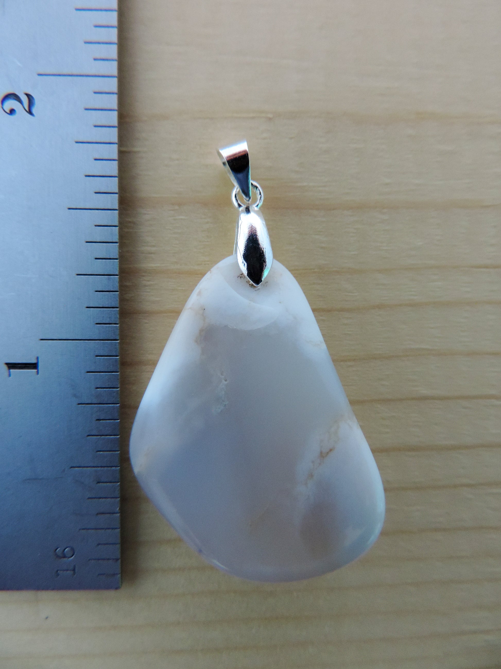 This rare stone is found in only a few locations in Montana, our material is hand collected on private property in the mountains and carried out in backpacks...each piece worth its weight in every step!  The translucent blue agate and its color variations have an alluring effect, many people find the blue agate a relaxing, calming and peaceful stone to wear.  Original and unique in design, each piece is hand crafted by lapidary artists in Montana.