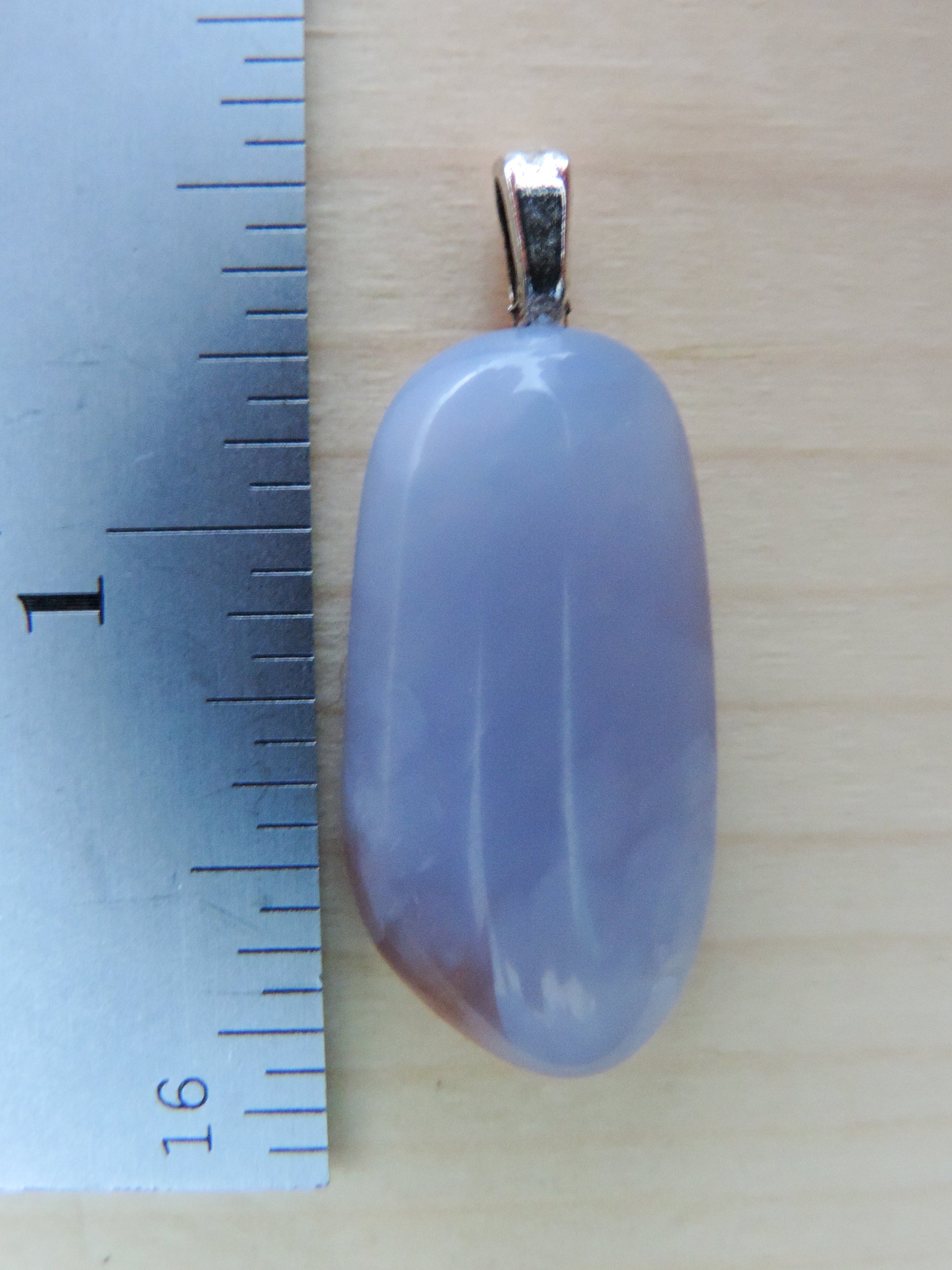 This rare stone is found in only a few locations in Montana, our material is hand collected on private property in the mountains and carried out in backpacks...each piece worth its weight in every step!  The translucent blue agate and its color variations have an alluring effect, many people find the blue agate a relaxing, calming and peaceful stone to wear.  Original and unique in design, each piece is hand crafted by lapidary artists in Montana.