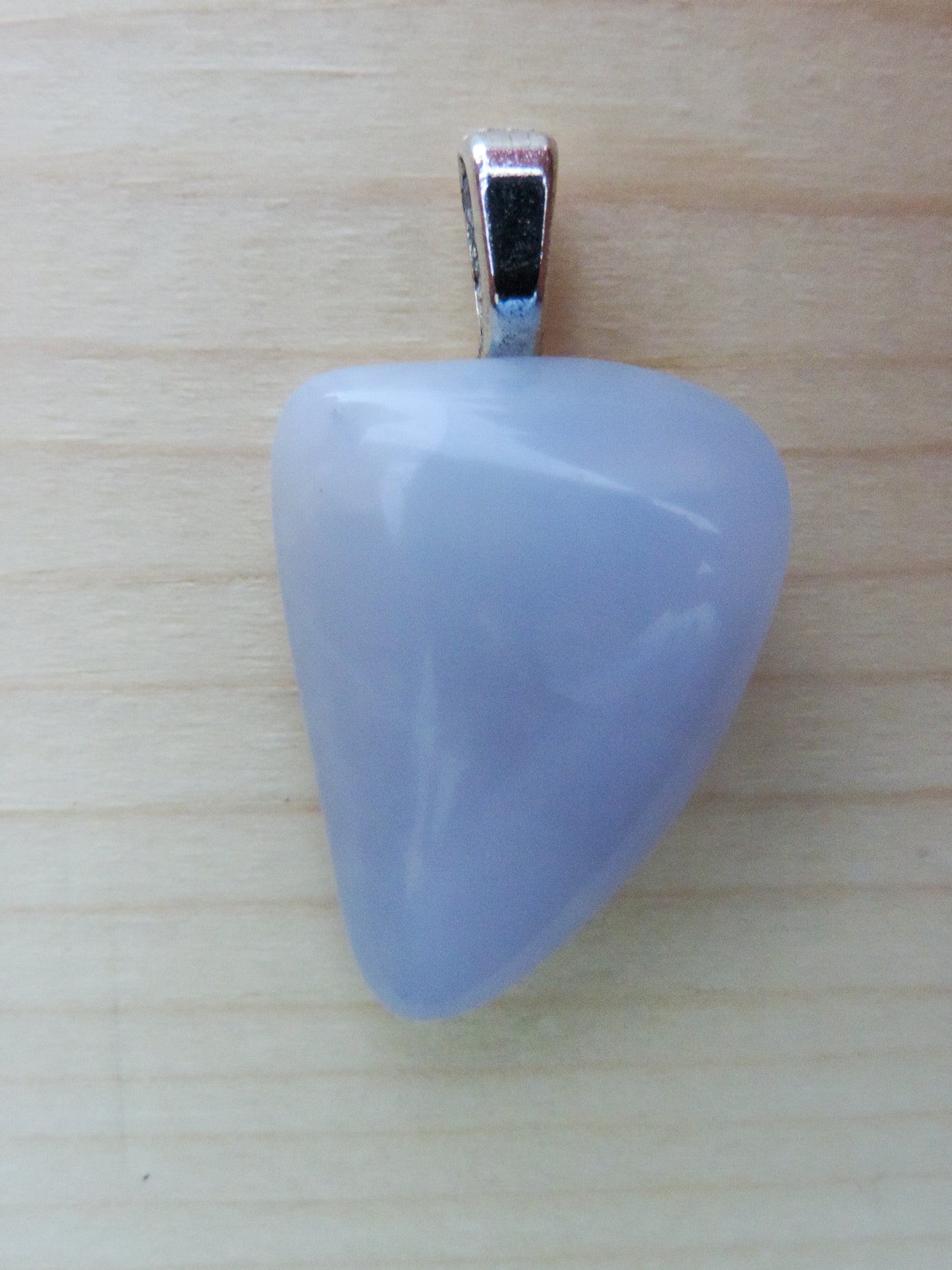 This rare stone is found in only a few locations in Montana, our material is hand collected on private property in the mountains and carried out in backpacks...each piece worth its weight in every step!  The translucent blue agate and its color variations have an alluring effect, many people find the blue agate a relaxing, calming and peaceful stone to wear.  Original and unique in design, each piece is hand crafted by lapidary artists in Montana.