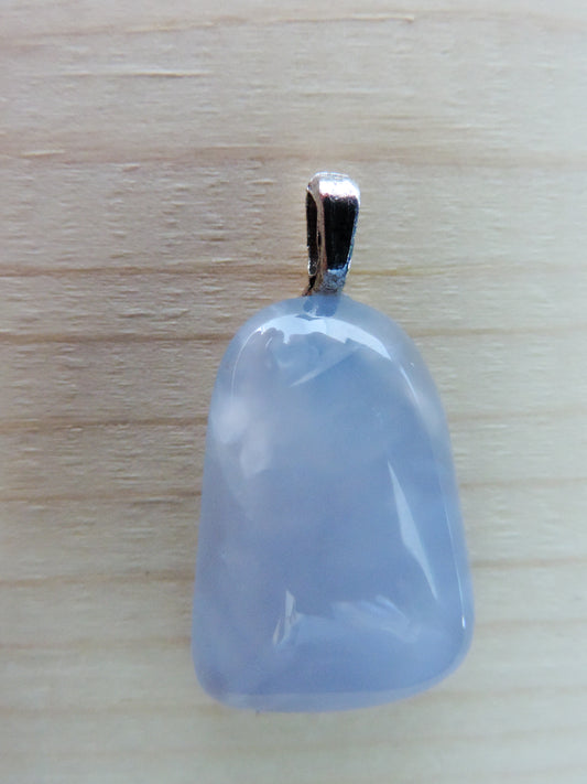 This rare stone is found in only a few locations in Montana, our material is hand collected on private property in the mountains and carried out in backpacks...each piece worth its weight in every step!  The translucent blue agate and its color variations have an alluring effect, many people find the blue agate a relaxing, calming and peaceful stone to wear.  Original and unique in design, each piece is hand crafted by lapidary artists in Montana.