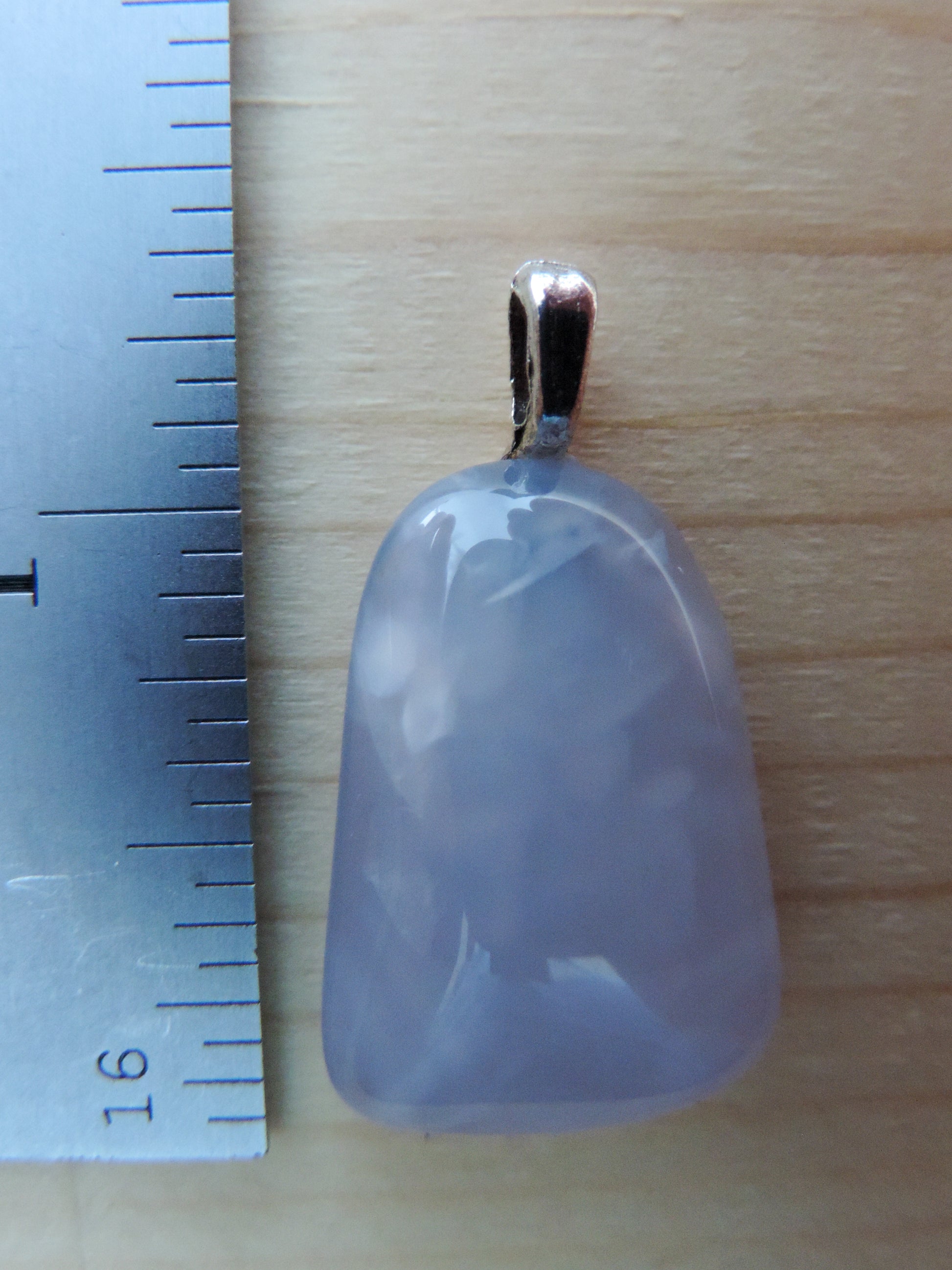 This rare stone is found in only a few locations in Montana, our material is hand collected on private property in the mountains and carried out in backpacks...each piece worth its weight in every step!  The translucent blue agate and its color variations have an alluring effect, many people find the blue agate a relaxing, calming and peaceful stone to wear.  Original and unique in design, each piece is hand crafted by lapidary artists in Montana.