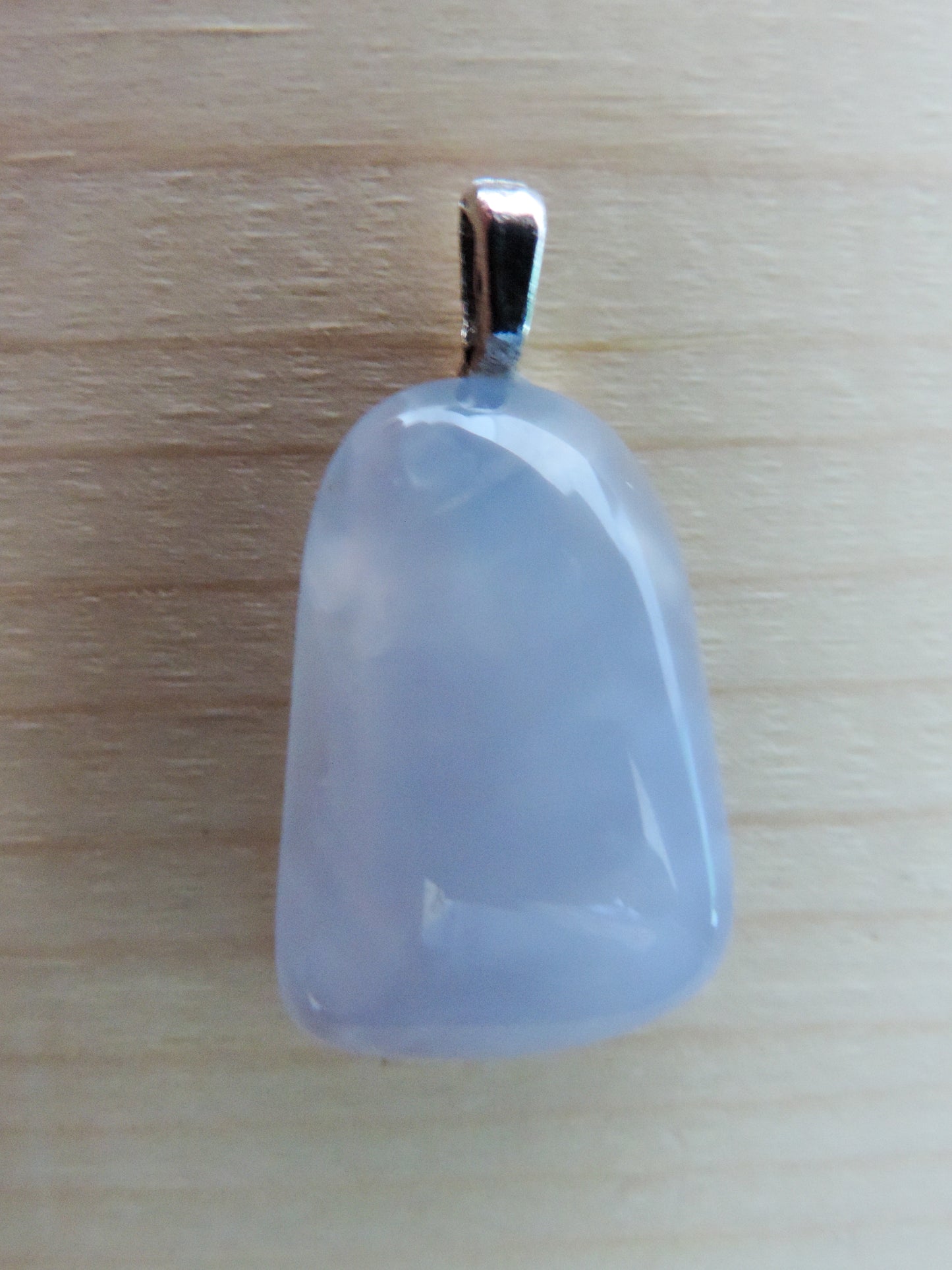 This rare stone is found in only a few locations in Montana, our material is hand collected on private property in the mountains and carried out in backpacks...each piece worth its weight in every step!  The translucent blue agate and its color variations have an alluring effect, many people find the blue agate a relaxing, calming and peaceful stone to wear.  Original and unique in design, each piece is hand crafted by lapidary artists in Montana.