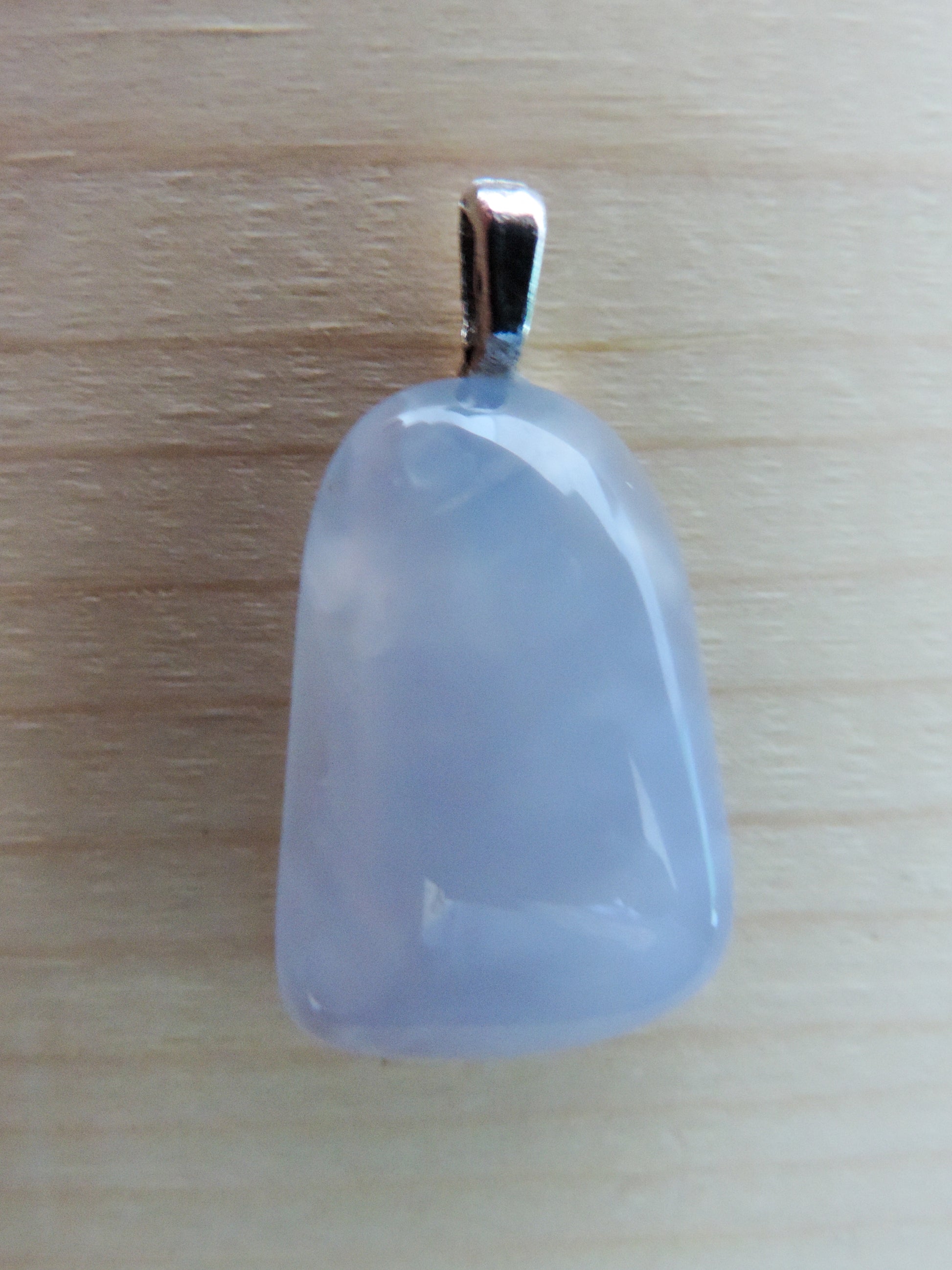 This rare stone is found in only a few locations in Montana, our material is hand collected on private property in the mountains and carried out in backpacks...each piece worth its weight in every step!  The translucent blue agate and its color variations have an alluring effect, many people find the blue agate a relaxing, calming and peaceful stone to wear.  Original and unique in design, each piece is hand crafted by lapidary artists in Montana.