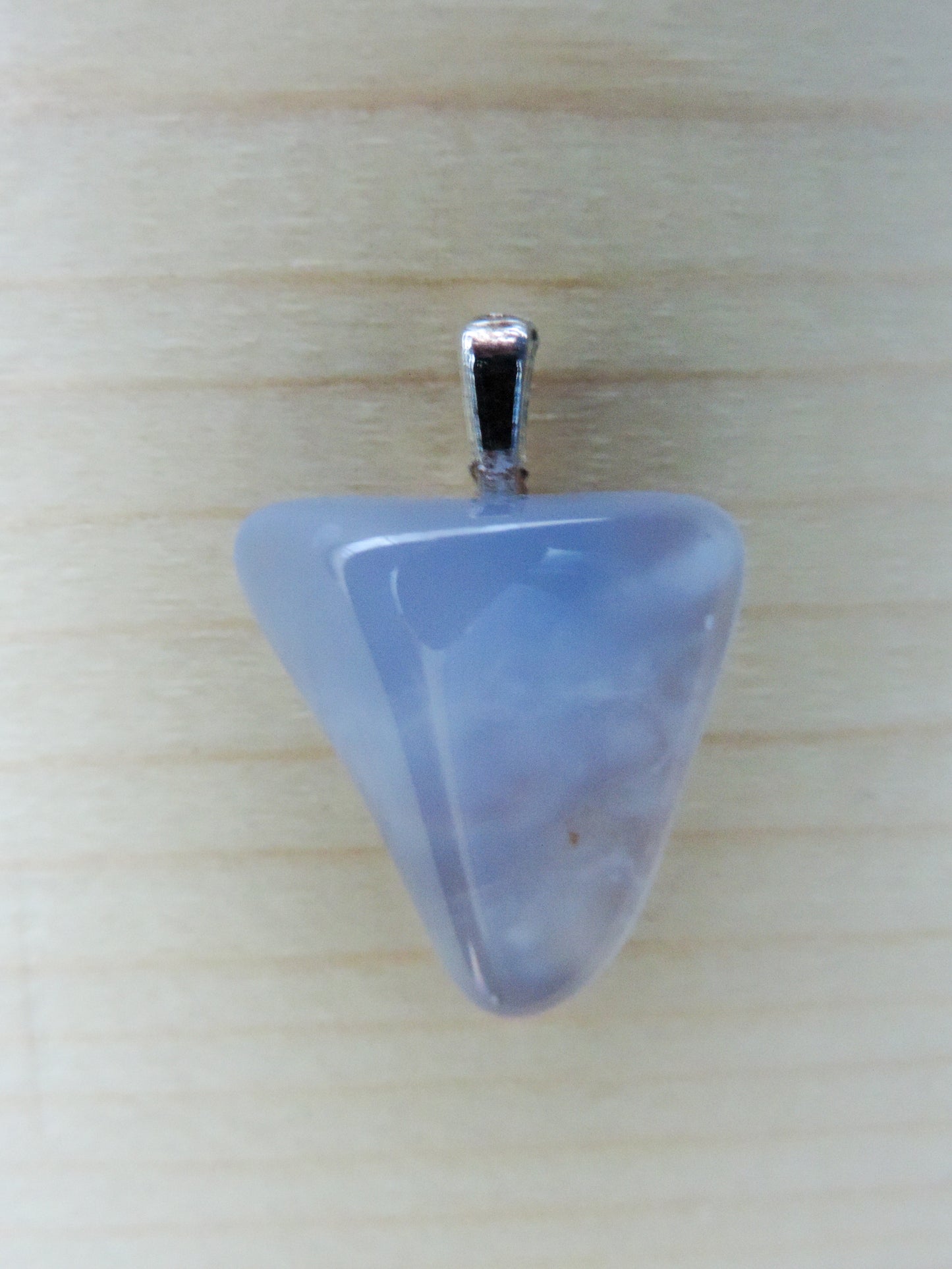 This rare stone is found in only a few locations in Montana, our material is hand collected on private property in the mountains and carried out in backpacks...each piece worth its weight in every step! The translucent blue agate and its color variations have an alluring effect, many people find the blue agate a relaxing, calming and peaceful stone to wear. Original and unique in design, each piece is hand crafted by lapidary artists in Montana.