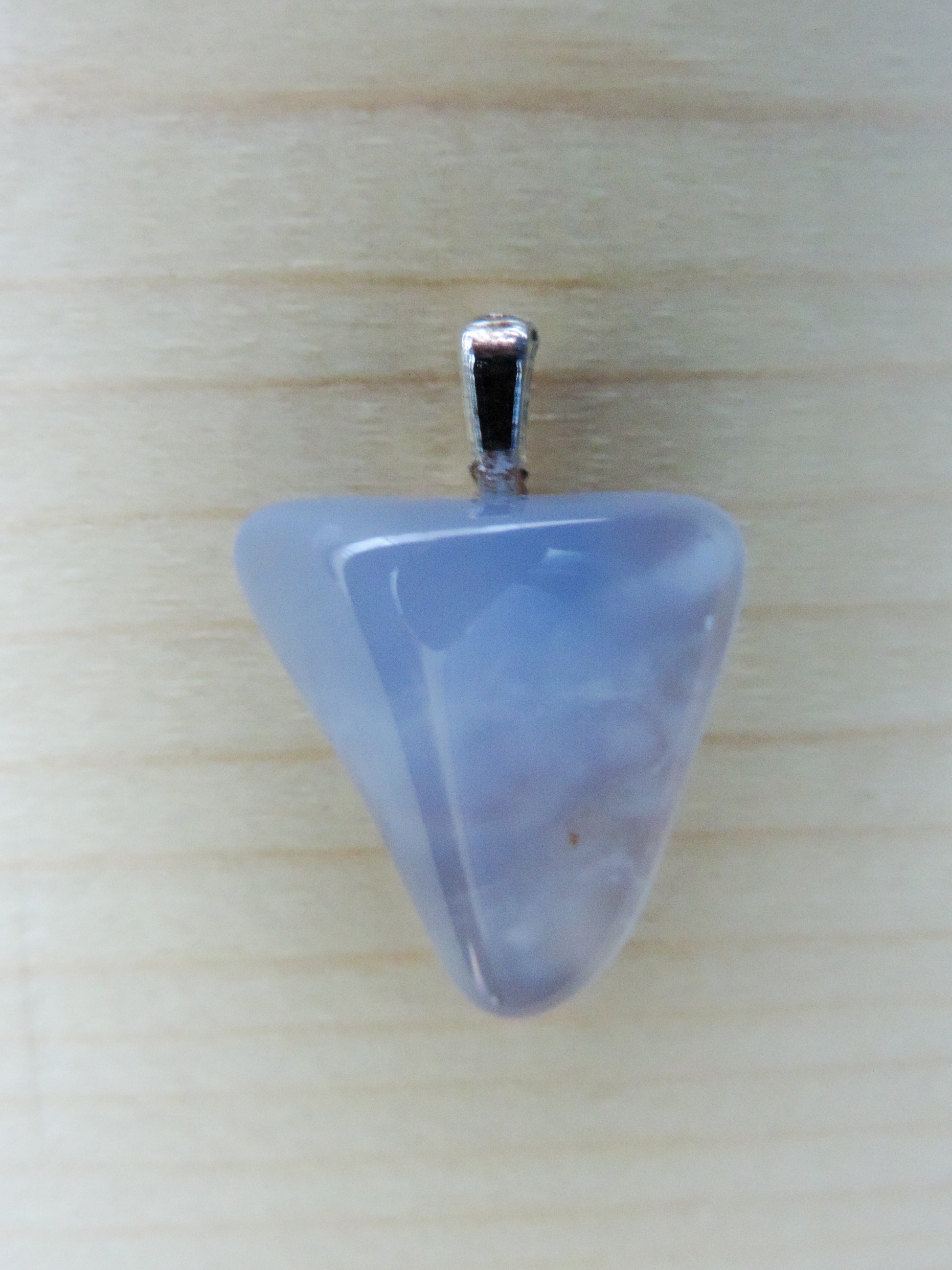 This rare stone is found in only a few locations in Montana, our material is hand collected on private property in the mountains and carried out in backpacks...each piece worth its weight in every step!  The translucent blue agate and its color variations have an alluring effect, many people find the blue agate a relaxing, calming and peaceful stone to wear.  Original and unique in design, each piece is hand crafted by lapidary artists in Montana.