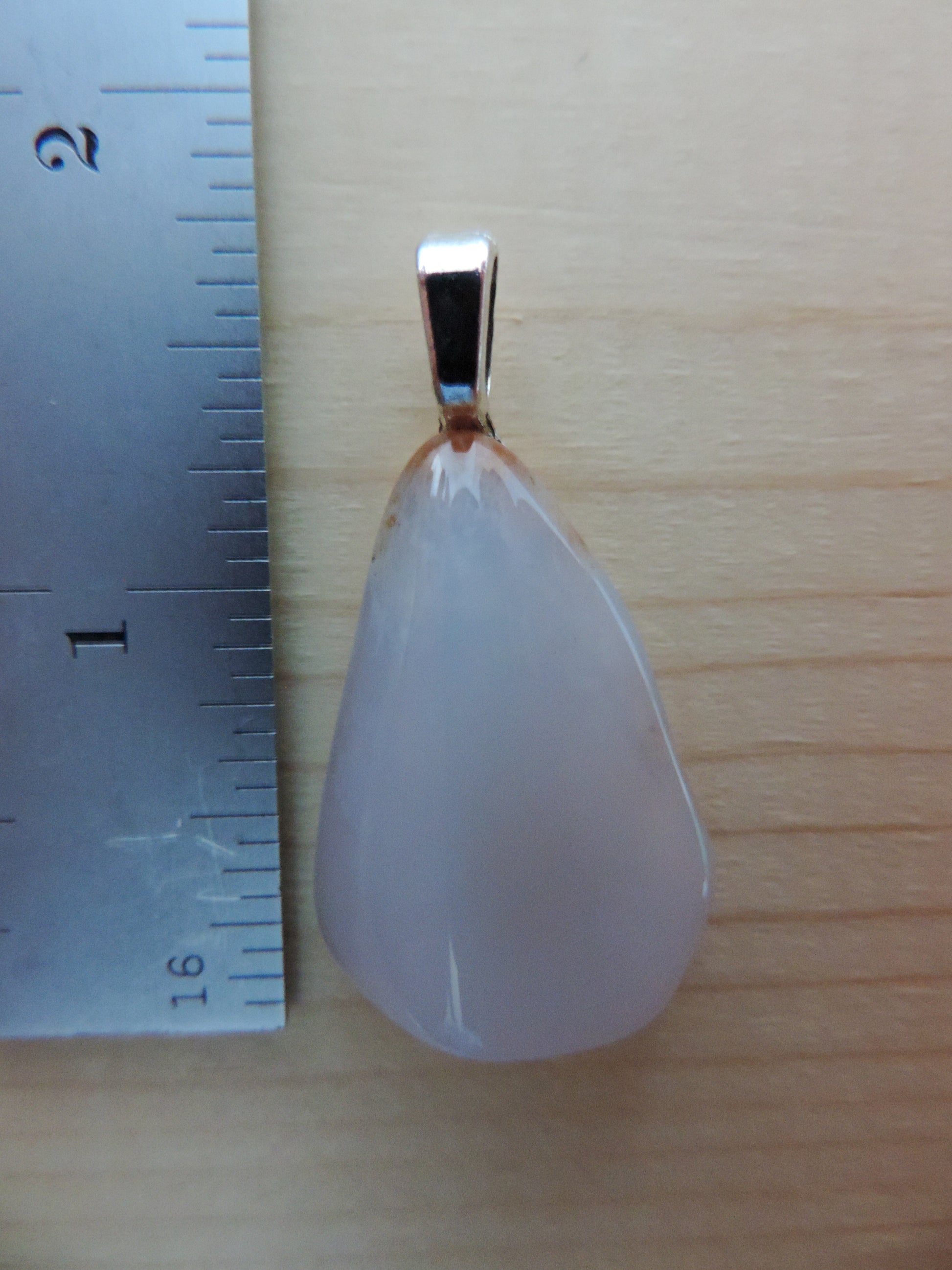 This rare stone is found in only a few locations in Montana, our material is hand collected on private property in the mountains and carried out in backpacks...each piece worth its weight in every step!  The translucent blue agate and its color variations have an alluring effect, many people find the blue agate a relaxing, calming and peaceful stone to wear.  Original and unique in design, each piece is hand crafted by lapidary artists in Montana.