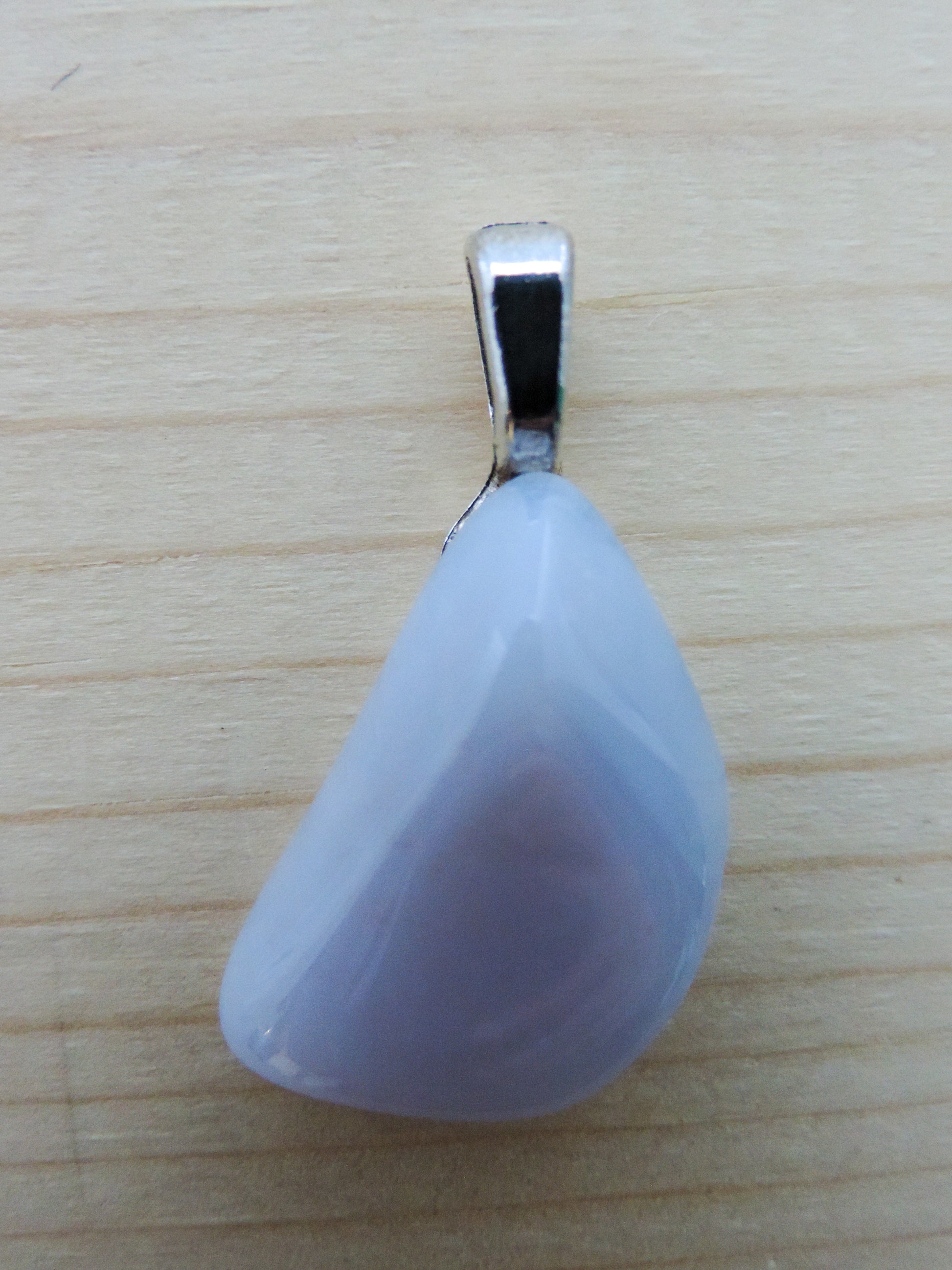 This rare stone is found in only a few locations in Montana, our material is hand collected on private property in the mountains and carried out in backpacks...each piece worth its weight in every step!  The translucent blue agate and its color variations have an alluring effect, many people find the blue agate a relaxing, calming and peaceful stone to wear.  Original and unique in design, each piece is hand crafted by lapidary artists in Montana.