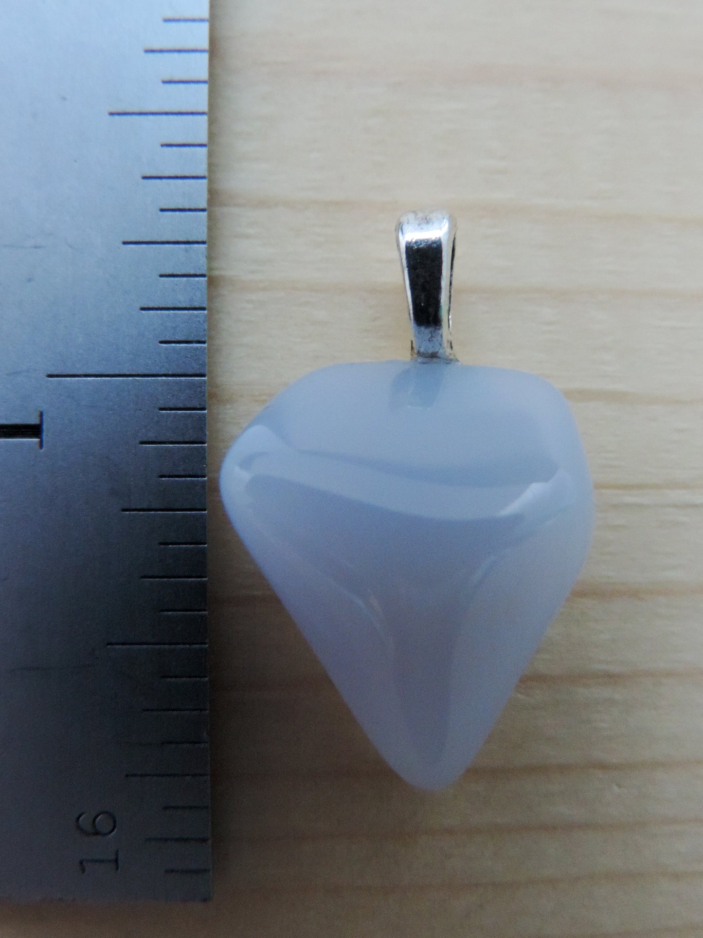 This rare stone is found in only a few locations in Montana, our material is hand collected on private property in the mountains and carried out in backpacks...each piece worth its weight in every step!  The translucent blue agate and its color variations have an alluring effect, many people find the blue agate a relaxing, calming and peaceful stone to wear.  Original and unique in design, each piece is hand crafted by lapidary artists in Montana.