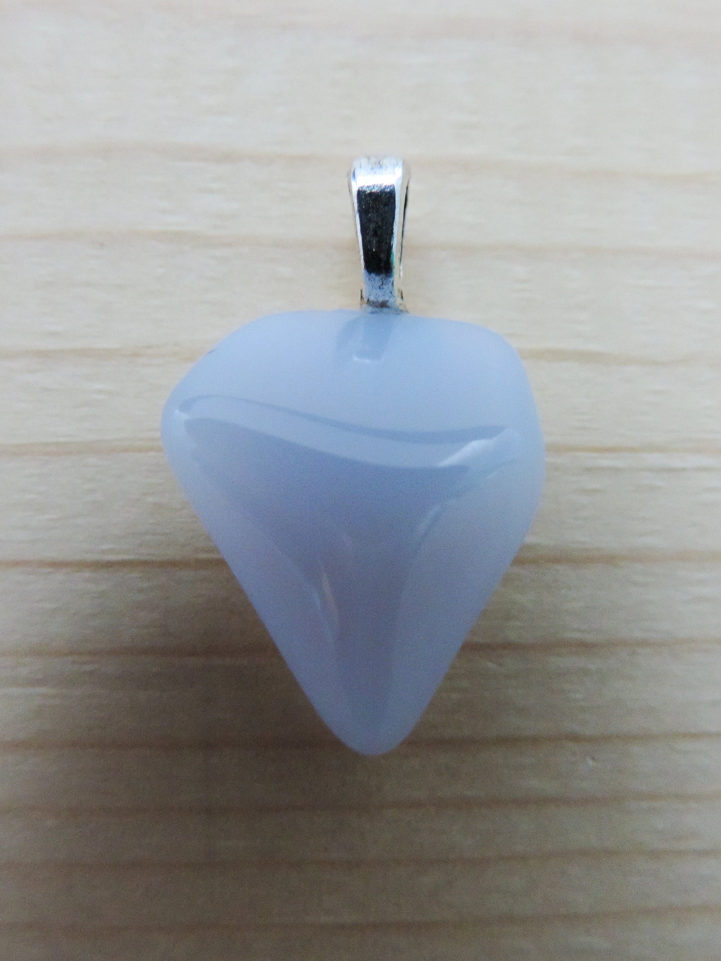 This rare stone is found in only a few locations in Montana, our material is hand collected on private property in the mountains and carried out in backpacks...each piece worth its weight in every step!  The translucent blue agate and its color variations have an alluring effect, many people find the blue agate a relaxing, calming and peaceful stone to wear.  Original and unique in design, each piece is hand crafted by lapidary artists in Montana.