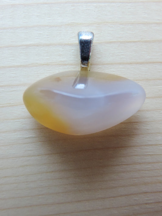 This rare stone is found in only a few locations in Montana, our material is hand collected on private property in the mountains and carried out in backpacks...each piece worth its weight in every step!  The translucent blue agate and its color variations have an alluring effect, many people find the blue agate a relaxing, calming and peaceful stone to wear.  Original and unique in design, each piece is hand crafted by lapidary artists in Montana.