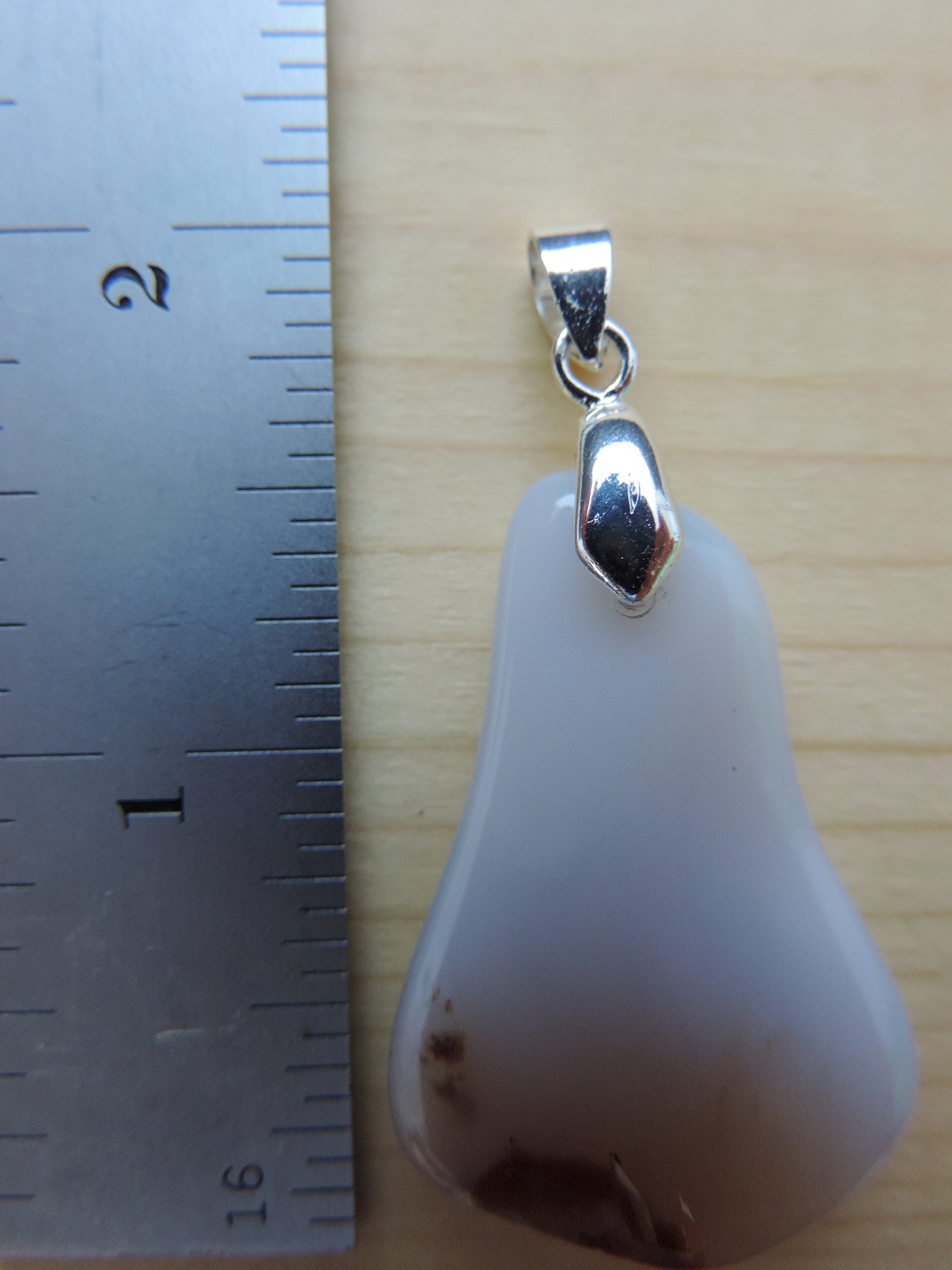 This rare stone is found in only a few locations in Montana, our material is hand collected on private property in the mountains and carried out in backpacks...each piece worth its weight in every step!  The translucent blue agate and its color variations have an alluring effect, many people find the blue agate a relaxing, calming and peaceful stone to wear.  Original and unique in design, each piece is hand crafted by lapidary artists in Montana.