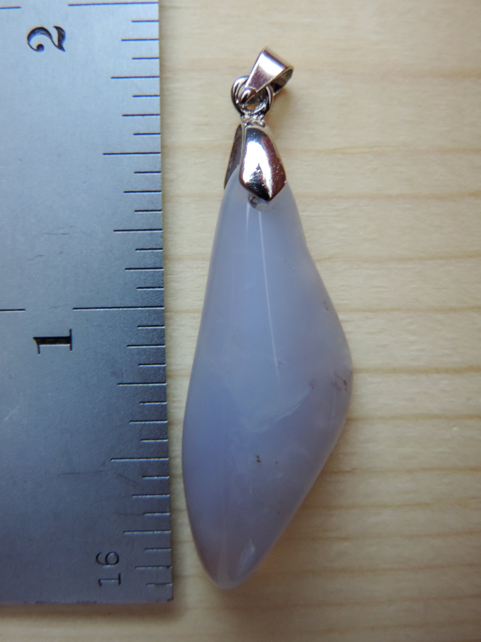 This rare stone is found in only a few locations in Montana, our material is hand collected on private property in the mountains and carried out in backpacks...each piece worth its weight in every step!  The translucent blue agate and its color variations have an alluring effect, many people find the blue agate a relaxing, calming and peaceful stone to wear.  Original and unique in design, each piece is hand crafted by lapidary artists in Montana.