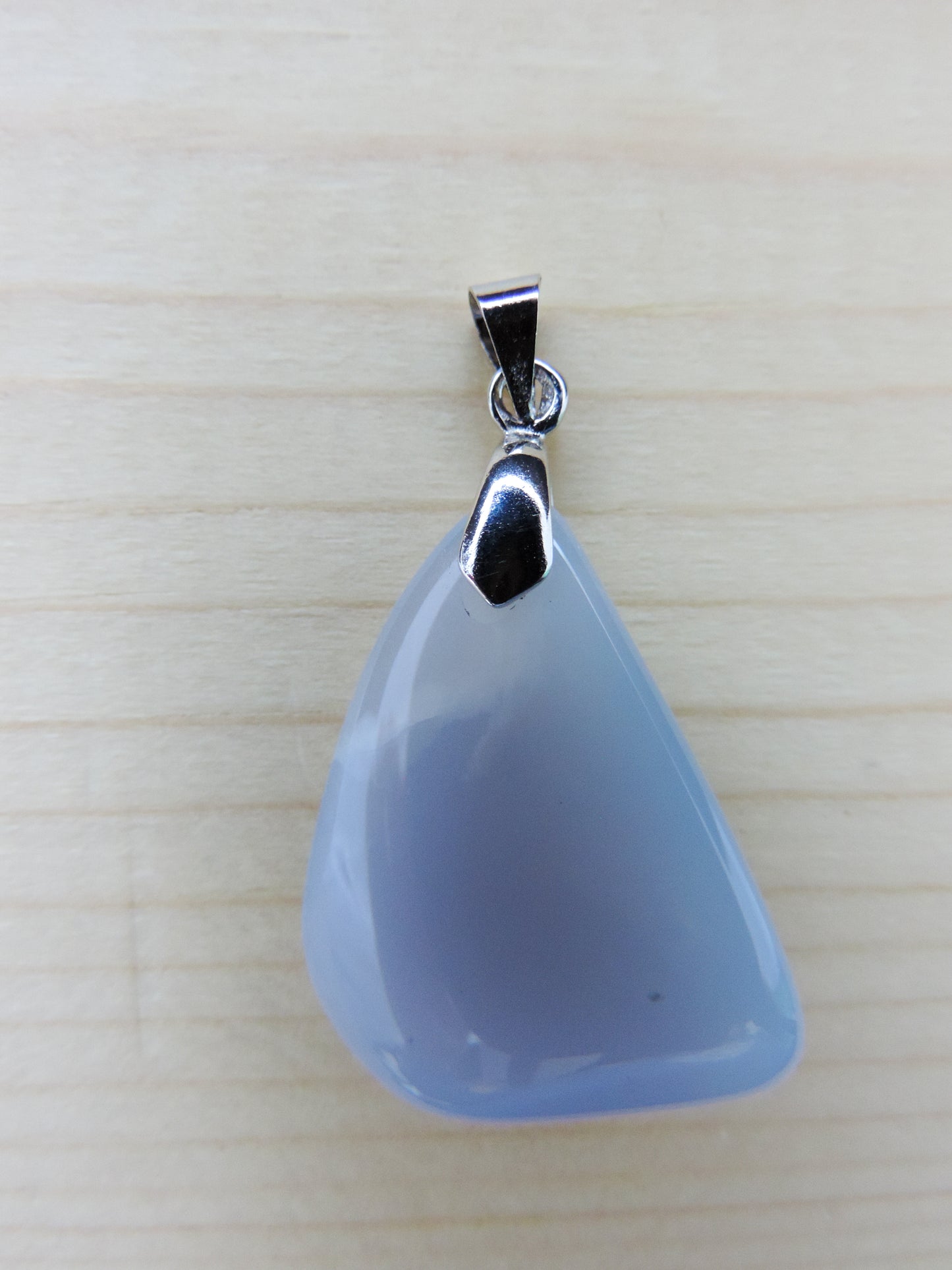 This rare stone is found in only a few locations in Montana, our material is hand collected on private property in the mountains and carried out in backpacks...each piece worth its weight in every step! The translucent blue agate and its color variations have an alluring effect, many people find the blue agate a relaxing, calming and peaceful stone to wear. Original and unique in design, each piece is hand crafted by lapidary artists in Montana.