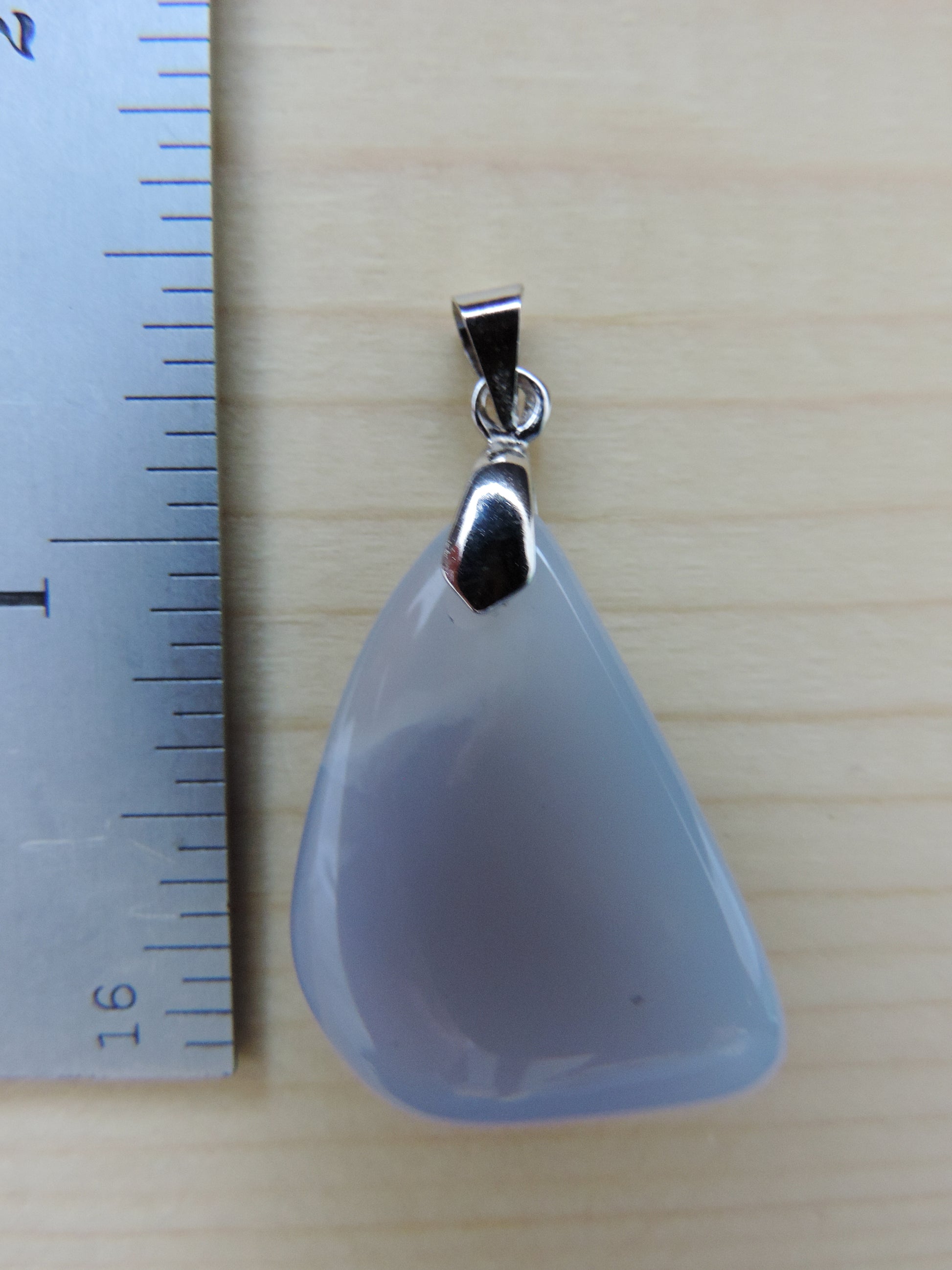 This rare stone is found in only a few locations in Montana, our material is hand collected on private property in the mountains and carried out in backpacks...each piece worth its weight in every step!  The translucent blue agate and its color variations have an alluring effect, many people find the blue agate a relaxing, calming and peaceful stone to wear.  Original and unique in design, each piece is hand crafted by lapidary artists in Montana.