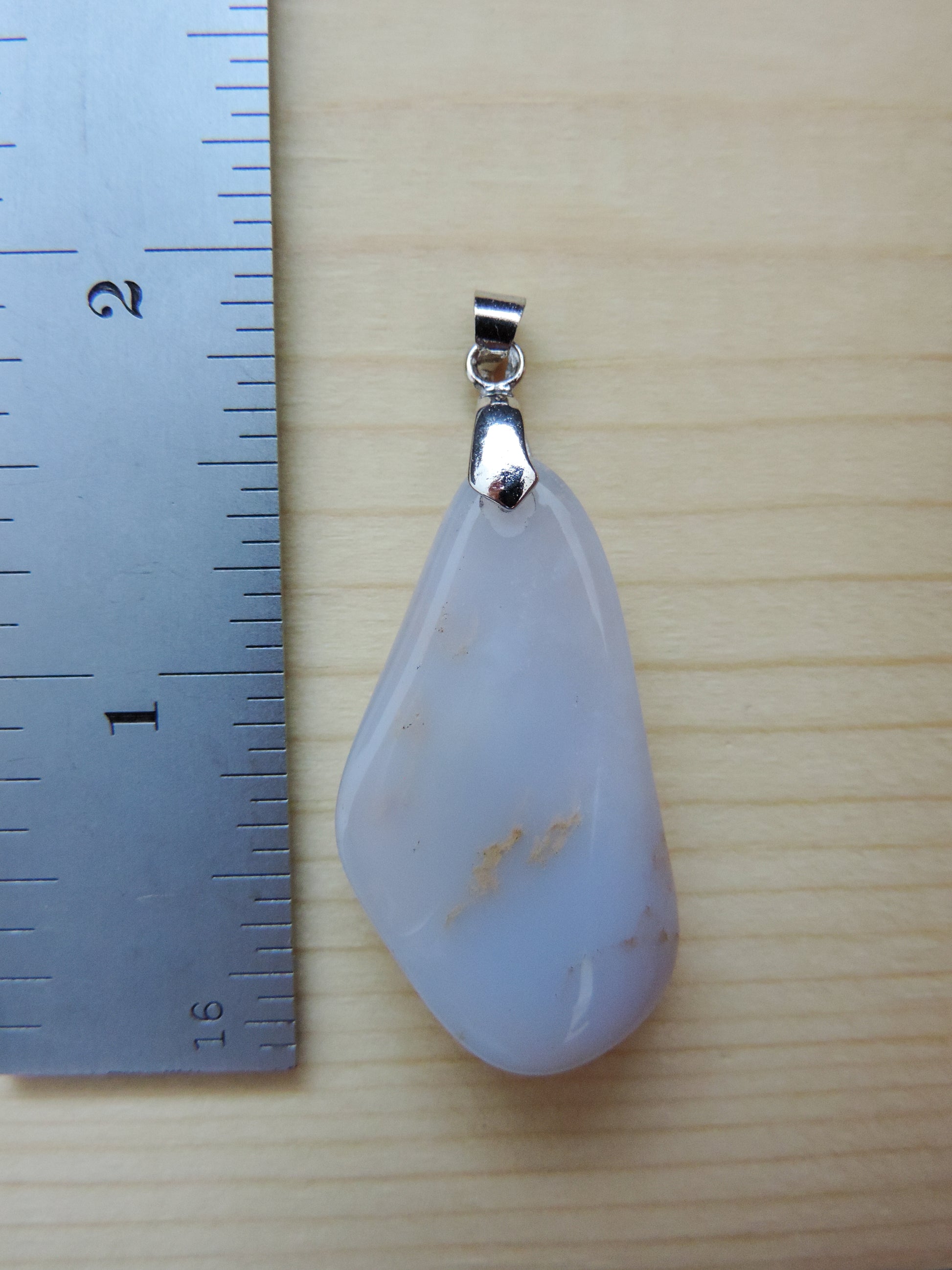 This rare stone is found in only a few locations in Montana, our material is hand collected on private property in the mountains and carried out in backpacks...each piece worth its weight in every step!  The translucent blue agate and its color variations have an alluring effect, many people find the blue agate a relaxing, calming and peaceful stone to wear.  Original and unique in design, each piece is hand crafted by lapidary artists in Montana.
