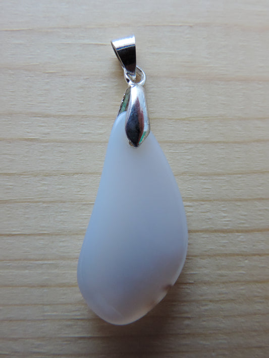 This rare stone is found in only a few locations in Montana, our material is hand collected on private property in the mountains and carried out in backpacks...each piece worth its weight in every step!  The translucent blue agate and its color variations have an alluring effect, many people find the blue agate a relaxing, calming and peaceful stone to wear.  Original and unique in design, each piece is hand crafted by lapidary artists in Montana.