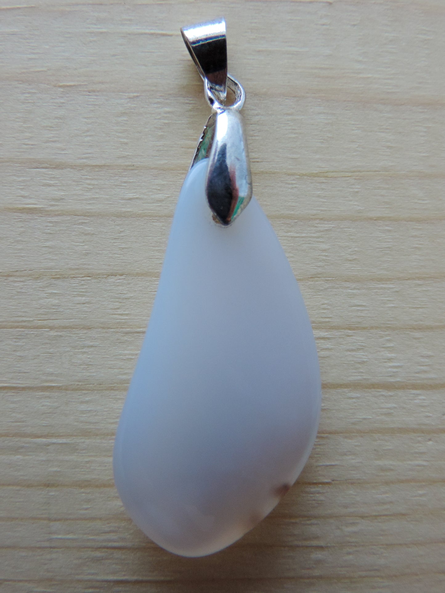 This rare stone is found in only a few locations in Montana, our material is hand collected on private property in the mountains and carried out in backpacks...each piece worth its weight in every step! The translucent blue agate and its color variations have an alluring effect, many people find the blue agate a relaxing, calming and peaceful stone to wear. Original and unique in design, each piece is hand crafted by lapidary artists in Montana.