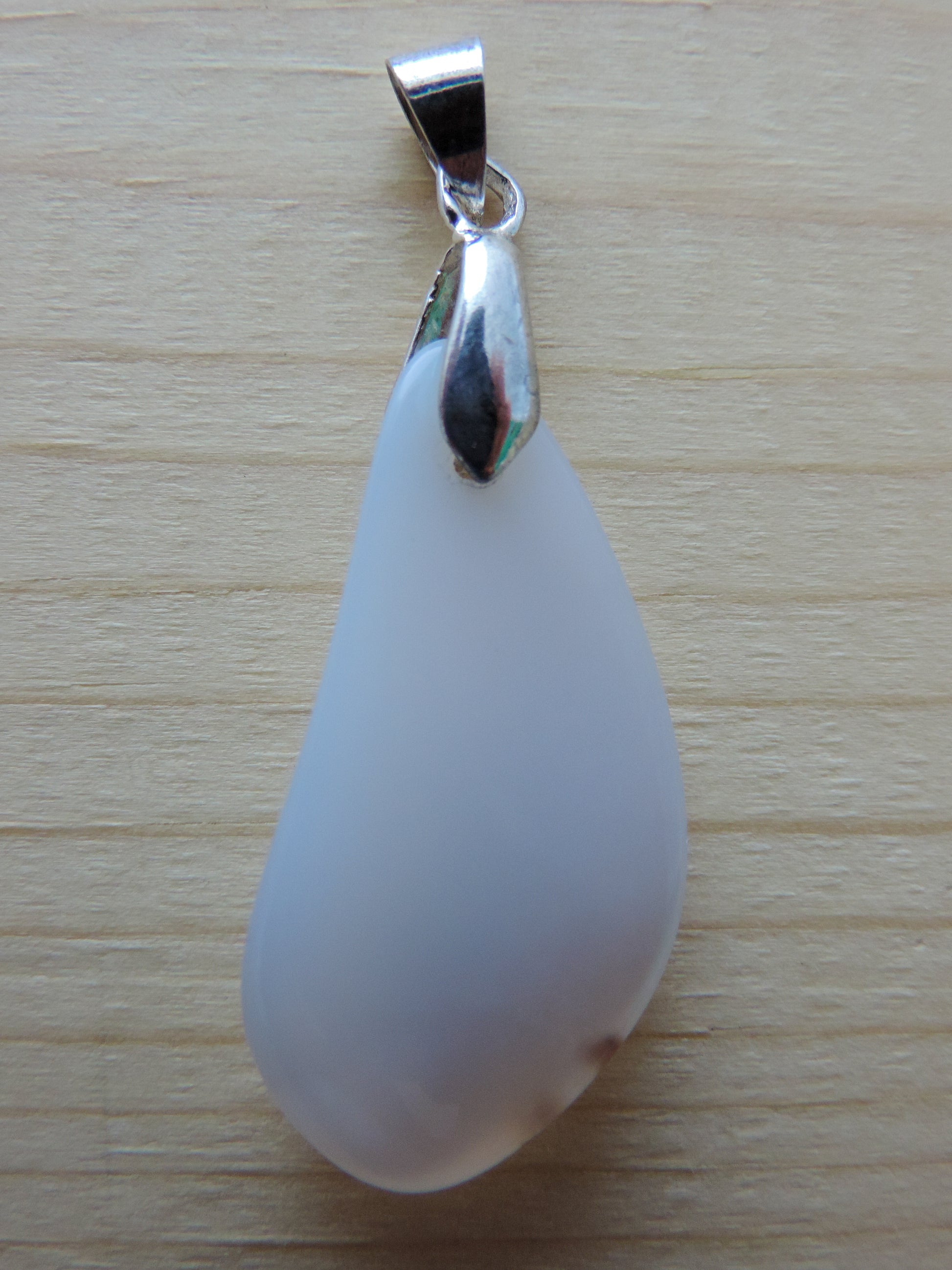 This rare stone is found in only a few locations in Montana, our material is hand collected on private property in the mountains and carried out in backpacks...each piece worth its weight in every step!  The translucent blue agate and its color variations have an alluring effect, many people find the blue agate a relaxing, calming and peaceful stone to wear.  Original and unique in design, each piece is hand crafted by lapidary artists in Montana.