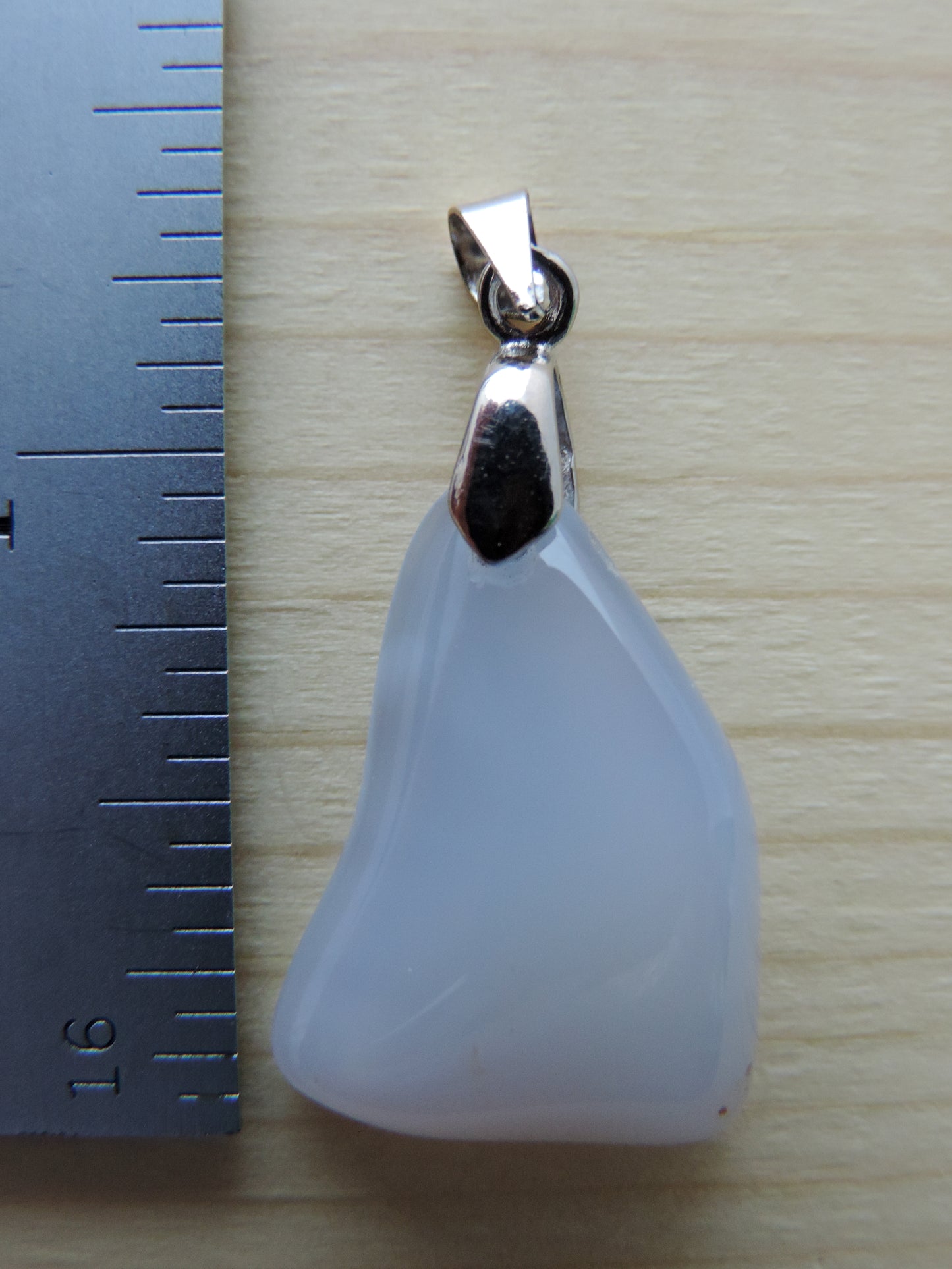 Known as the Treasure State, Montana’s landscape is an abundant resource for precious and semi-precious stones. One of the semi-precious stones, Madison Blue Agate, is featured in this pendant. This rare stone is found in only a few locations in Montana, our material is hand collected on private property in the mountains and carried out in backpacks...each piece worth its weight in every step!