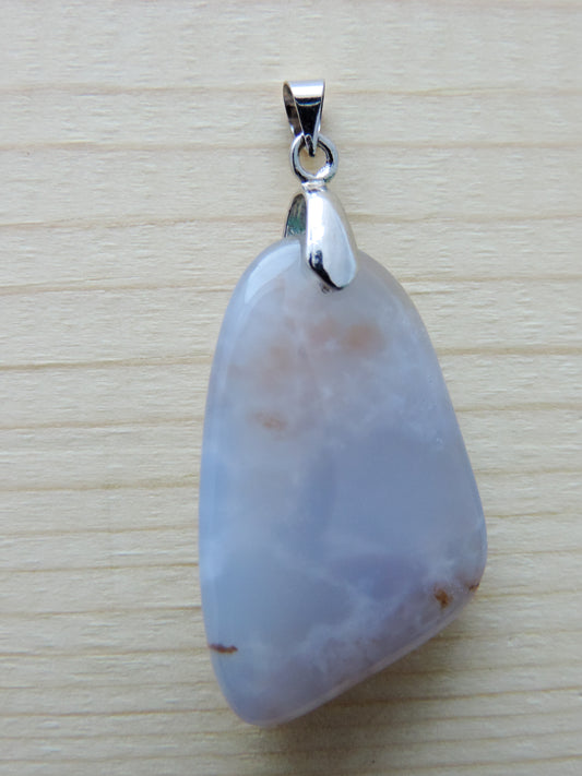 This rare stone is found in only a few locations in Montana, our material is hand collected on private property in the mountains and carried out in backpacks...each piece worth its weight in every step!  The translucent blue agate and its color variations have an alluring effect, many people find the blue agate a relaxing, calming and peaceful stone to wear.  Original and unique in design, each piece is hand crafted by lapidary artists in Montana.