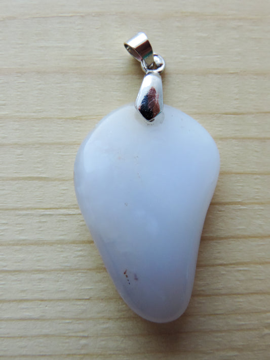 This rare stone is found in only a few locations in Montana, our material is hand collected on private property in the mountains and carried out in backpacks...each piece worth its weight in every step!  The translucent blue agate and its color variations have an alluring effect, many people find the blue agate a relaxing, calming and peaceful stone to wear.  Original and unique in design, each piece is hand crafted by lapidary artists in Montana.