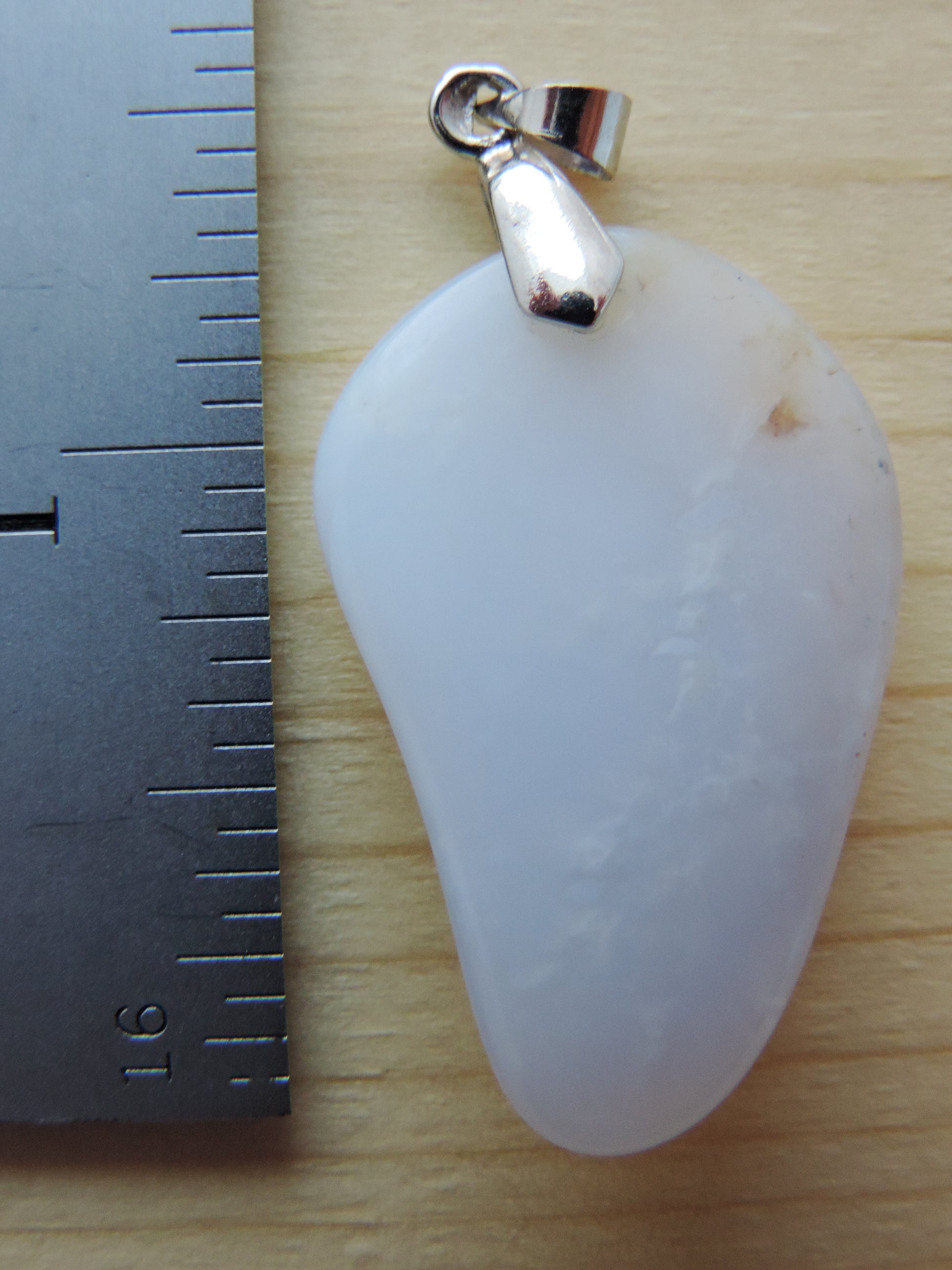 This rare stone is found in only a few locations in Montana, our material is hand collected on private property in the mountains and carried out in backpacks...each piece worth its weight in every step!  The translucent blue agate and its color variations have an alluring effect, many people find the blue agate a relaxing, calming and peaceful stone to wear.  Original and unique in design, each piece is hand crafted by lapidary artists in Montana.